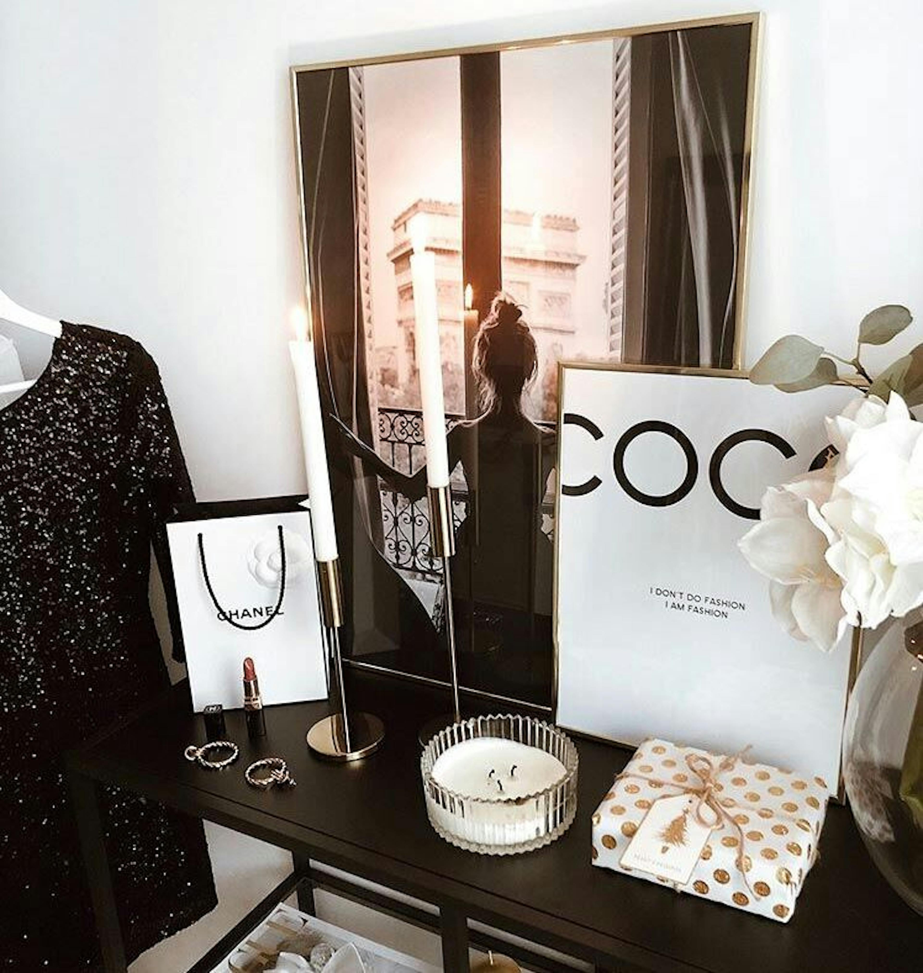 Trendy photo wall with a girl and Chanel