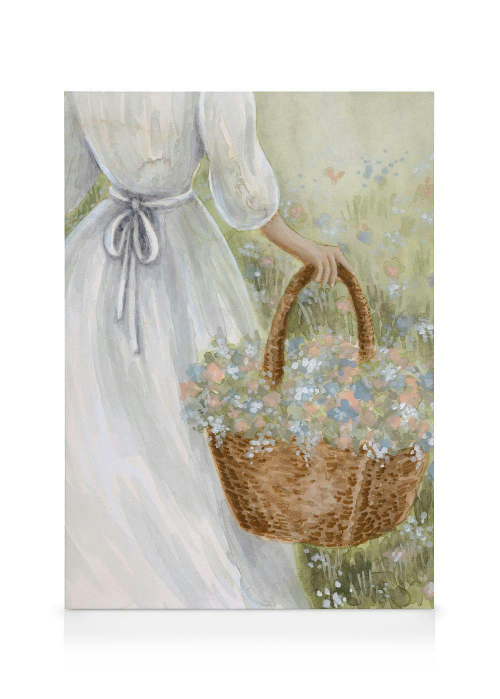Lerretsbilde av en kvinne i hvit kjole som holder en kurv med fargerike blomster i en eng.