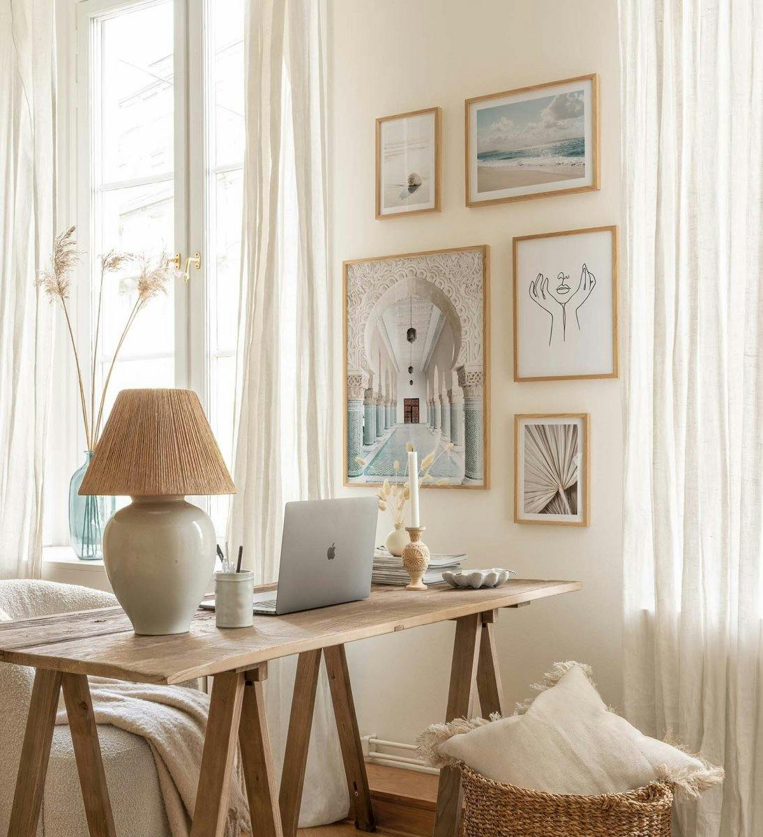 Tropic landscape gallery wall in blue and beige with oak frames for the office