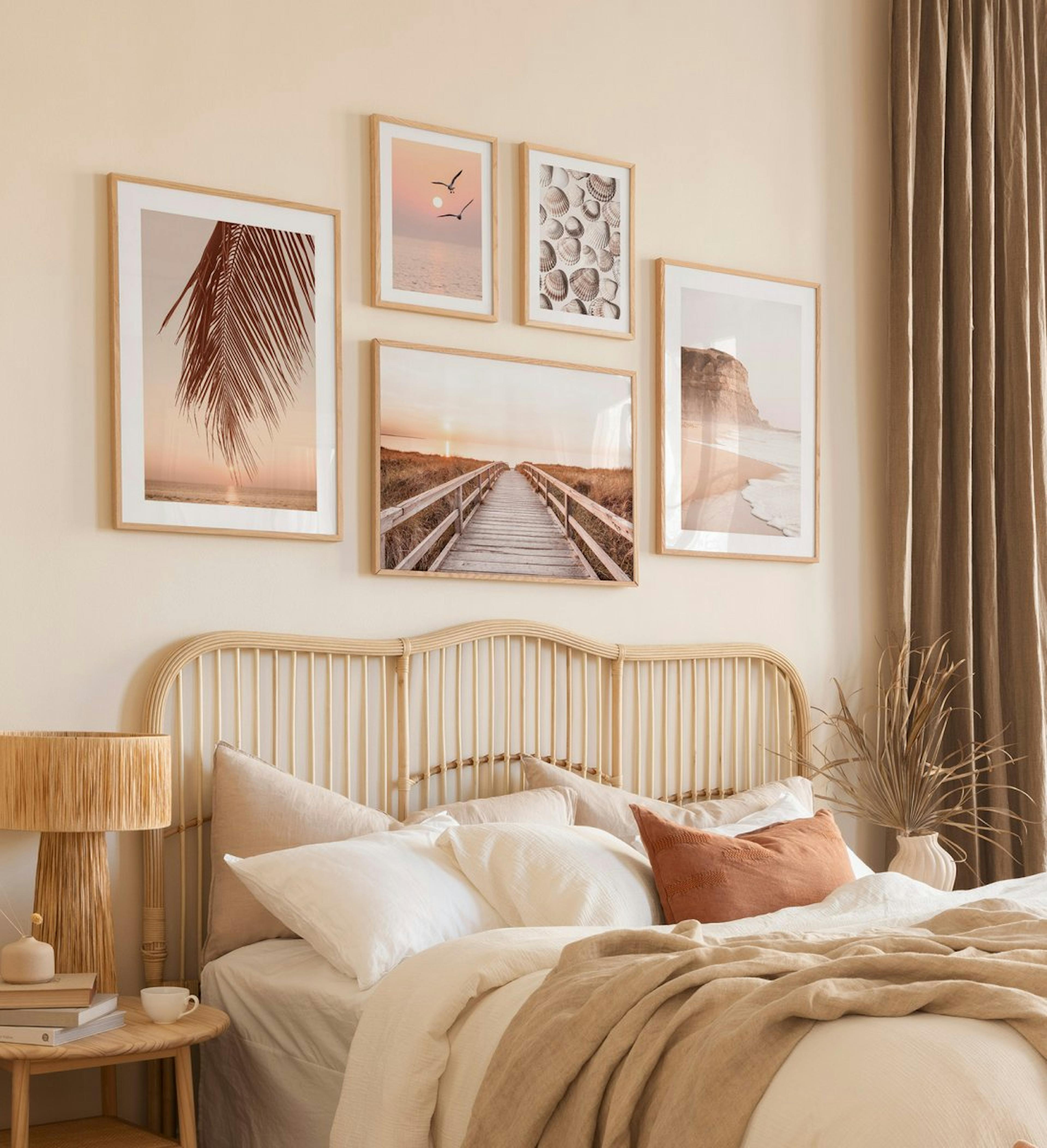 Gallery wall with nature motives perfect for the bedroom displayed in oak frames.