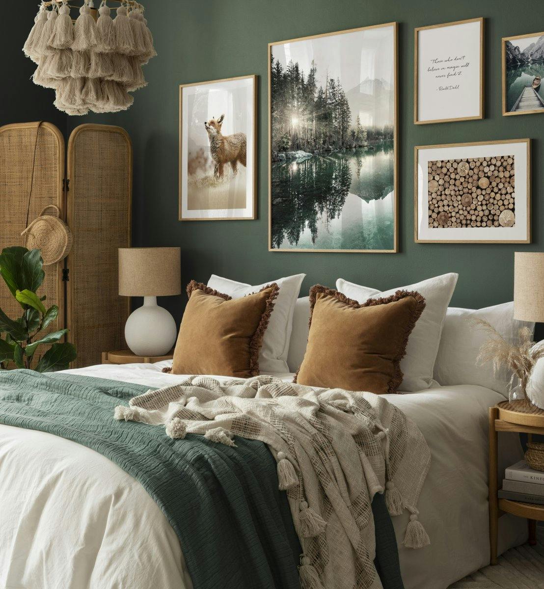 A poster featuring a sunlit forest and lake with reflections, displayed in a bedroom with a green wall.