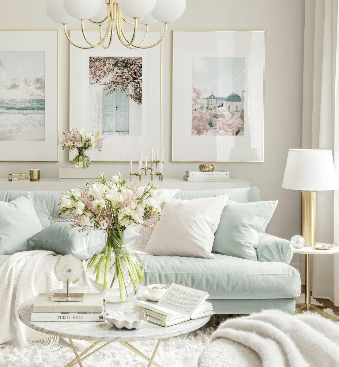 A poster featuring a light blue door surrounded by pink bougainvillea in a cozy living room setting.