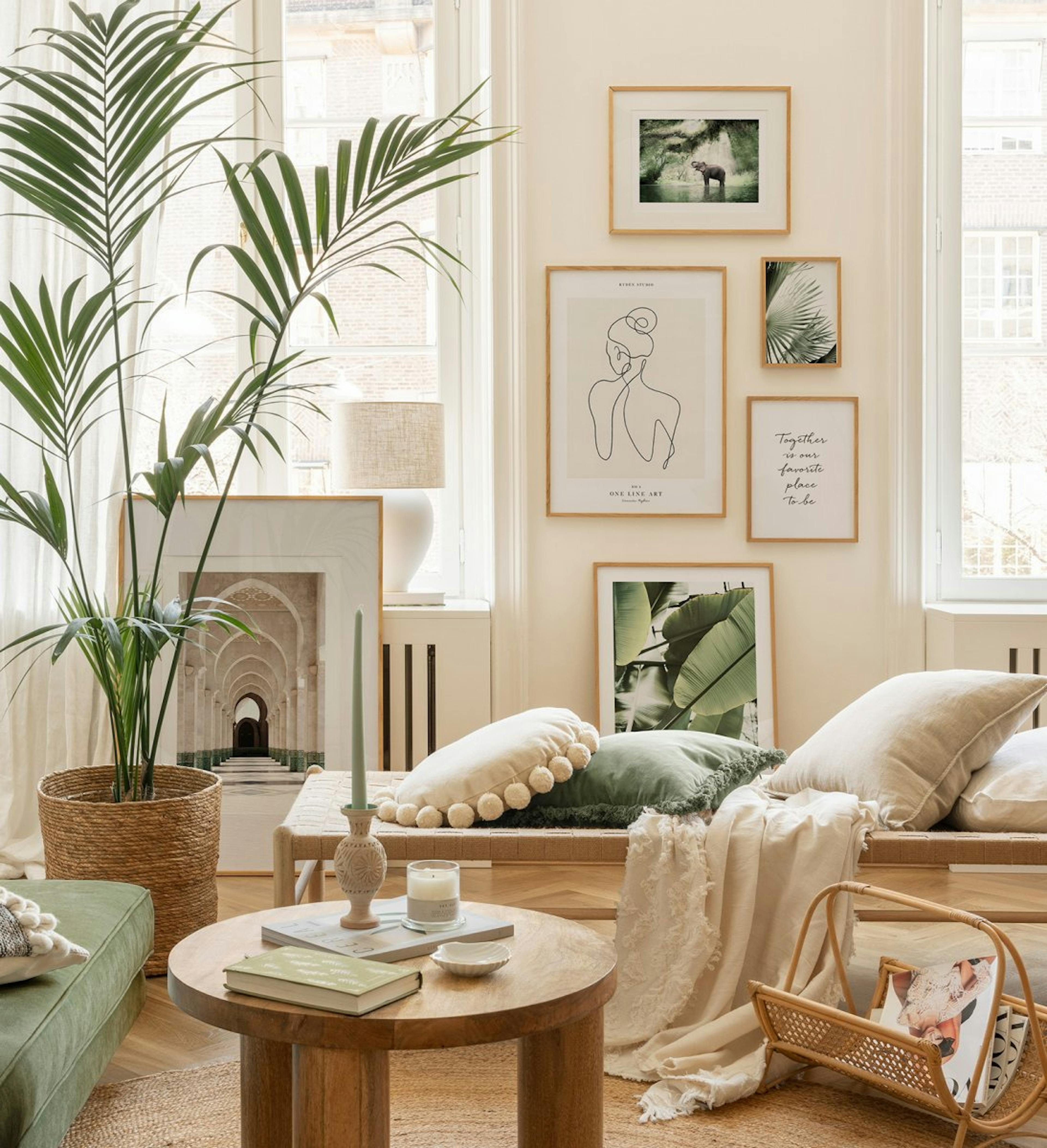 Green and tropical gallery wall with nature prints and illustrations with oak frames for living room