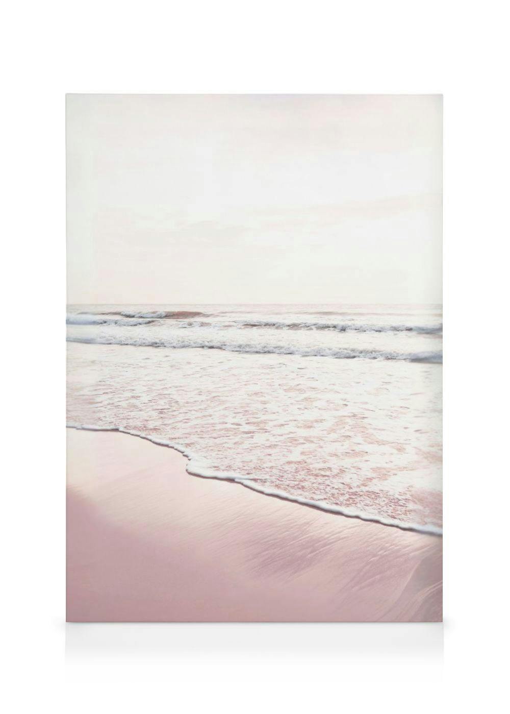 A canvas showing a serene beach scene with pale pink sand and gentle ocean waves under a soft, bright sky.