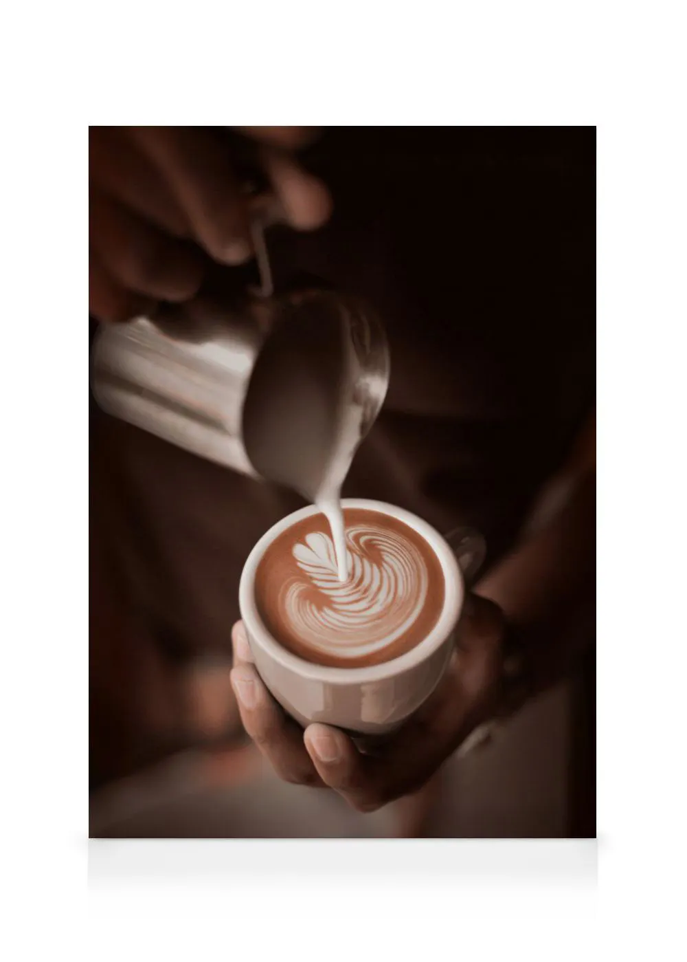 A canvas of a barista pouring milk into a coffee cup, creating latte art with a heart and leaf design.