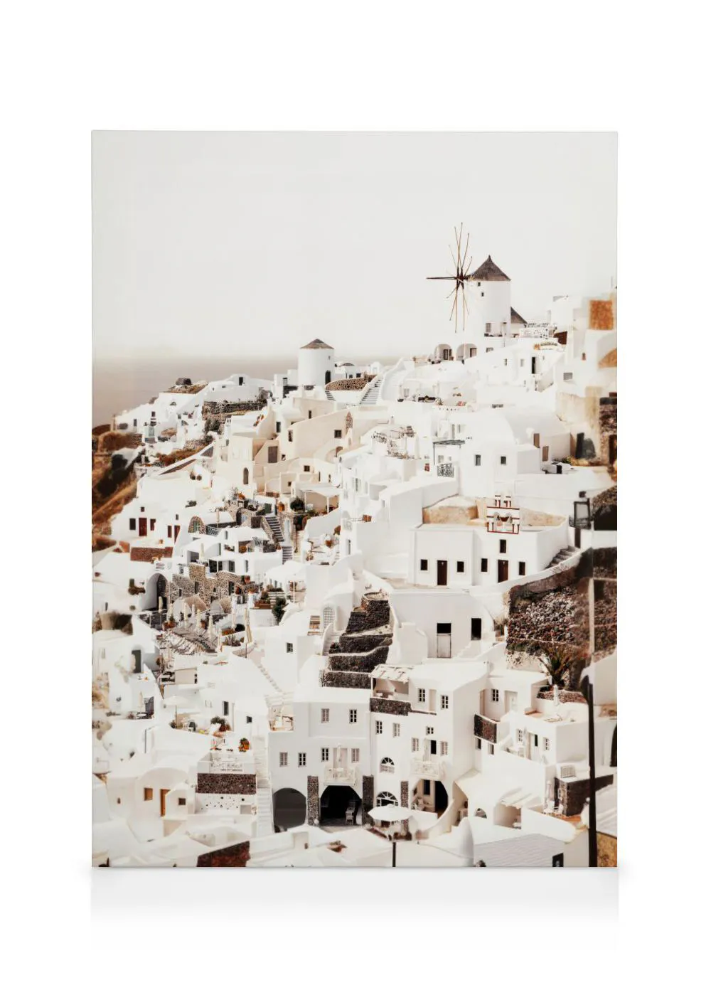 A canvas showing a Santorini village landscape with white buildings, winding paths, and a windmill on a hillside.