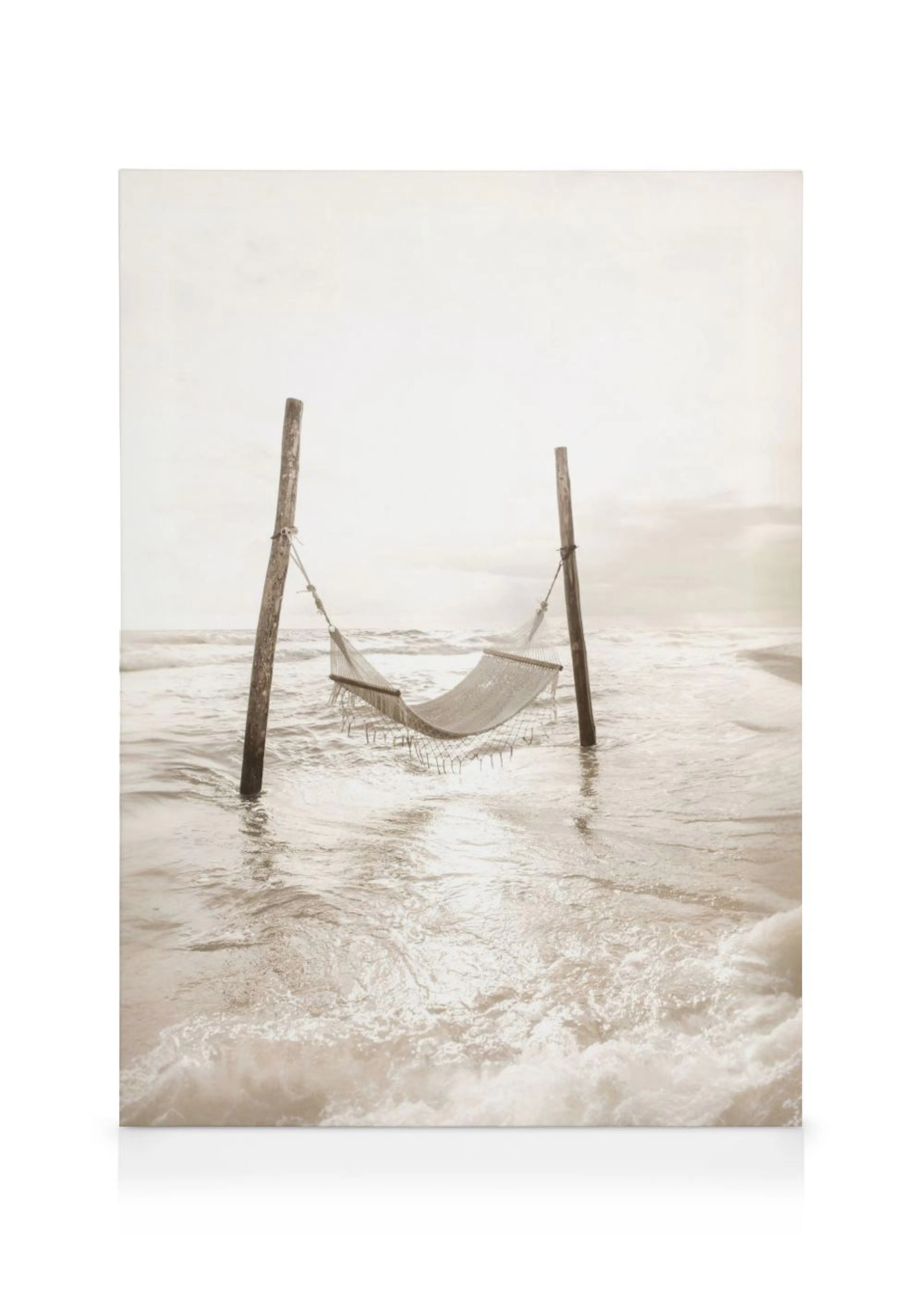 A sepia-toned canvas featuring a hammock suspended between two wooden poles in shallow ocean water with waves breaking.