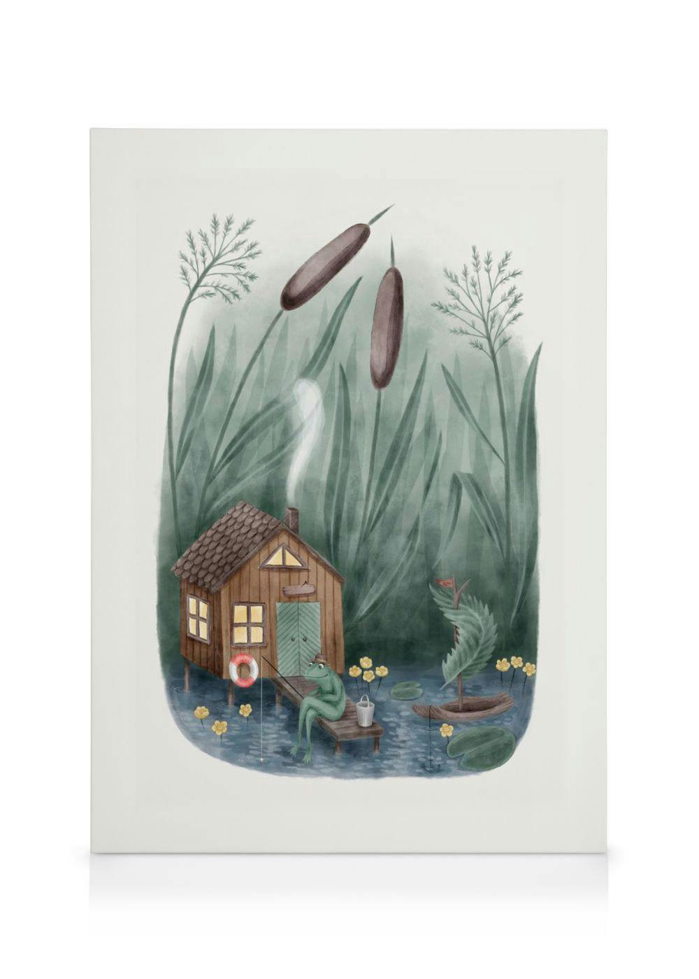 Toile illustrée dune grenouille pêchant devant une cabane en bois, entourée de nénuphars et de roseaux.