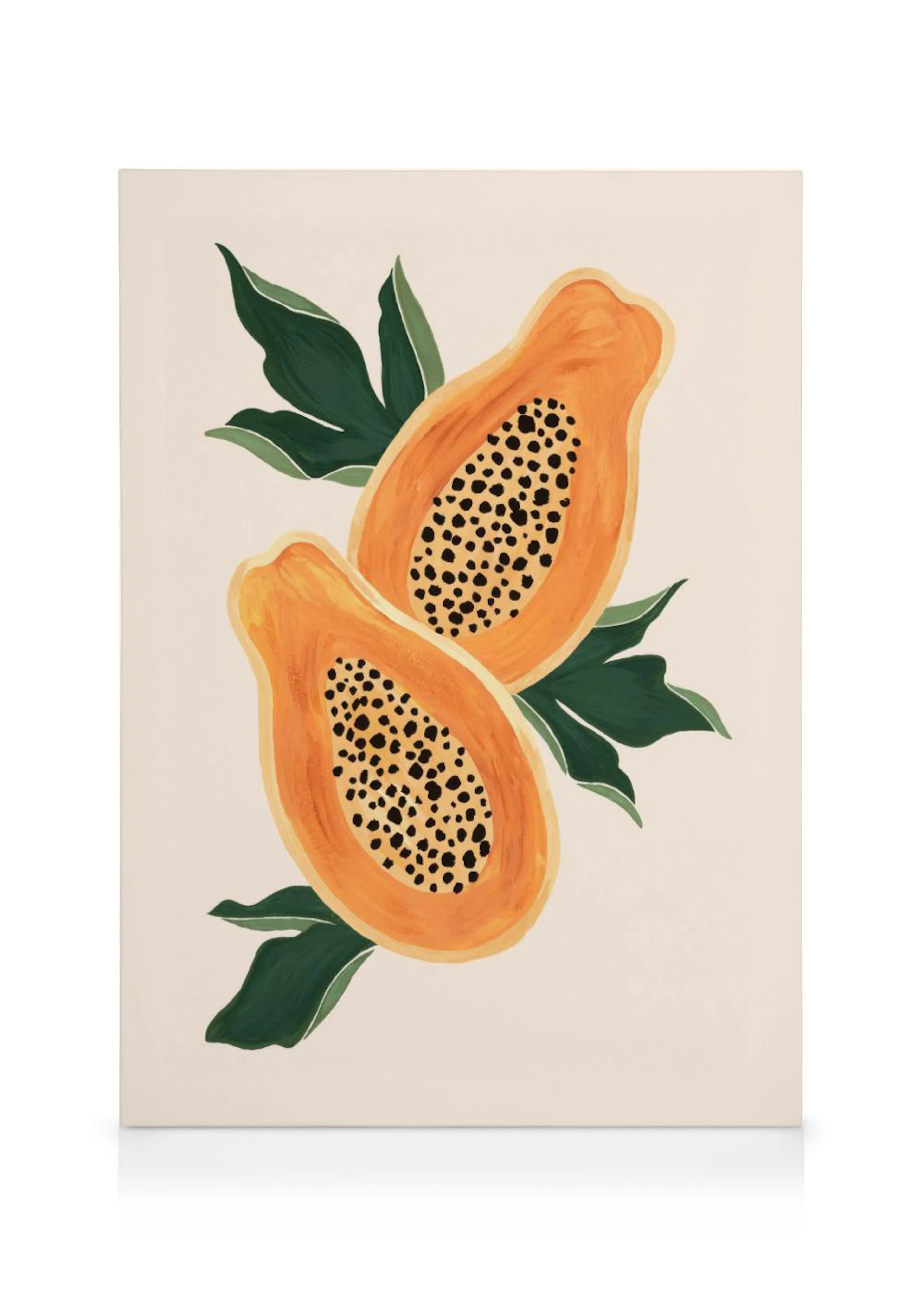 A colourful canvas print featuring two halves of a papaya with green leaves on a light background.