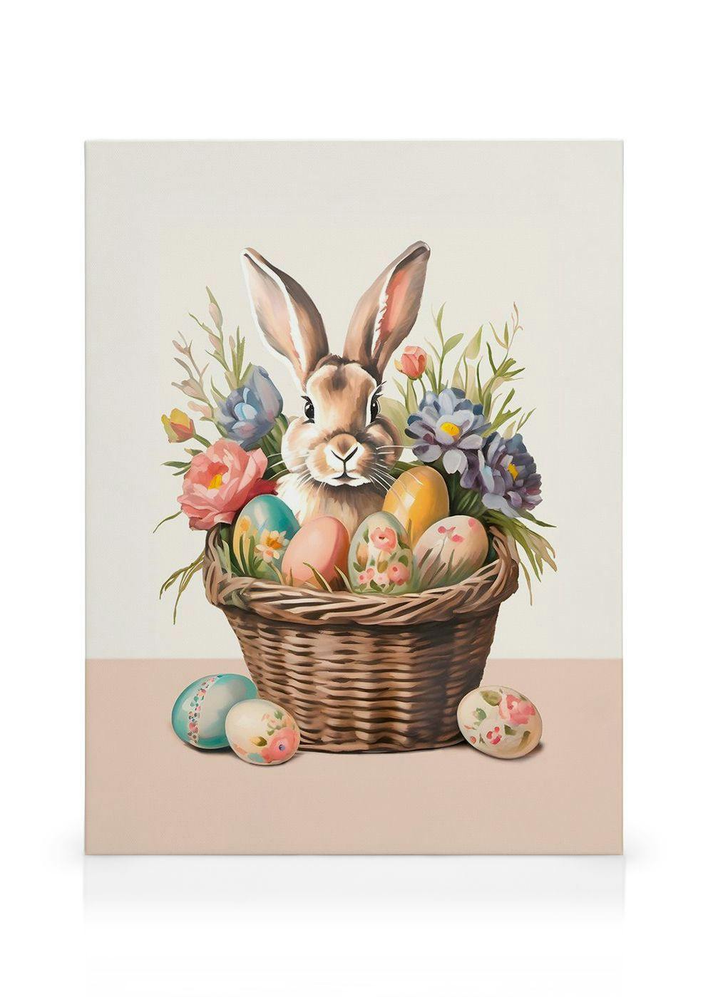 Une toile représentant un lapin de Pâques dans un panier dœufs décorés et de fleurs colorées.
