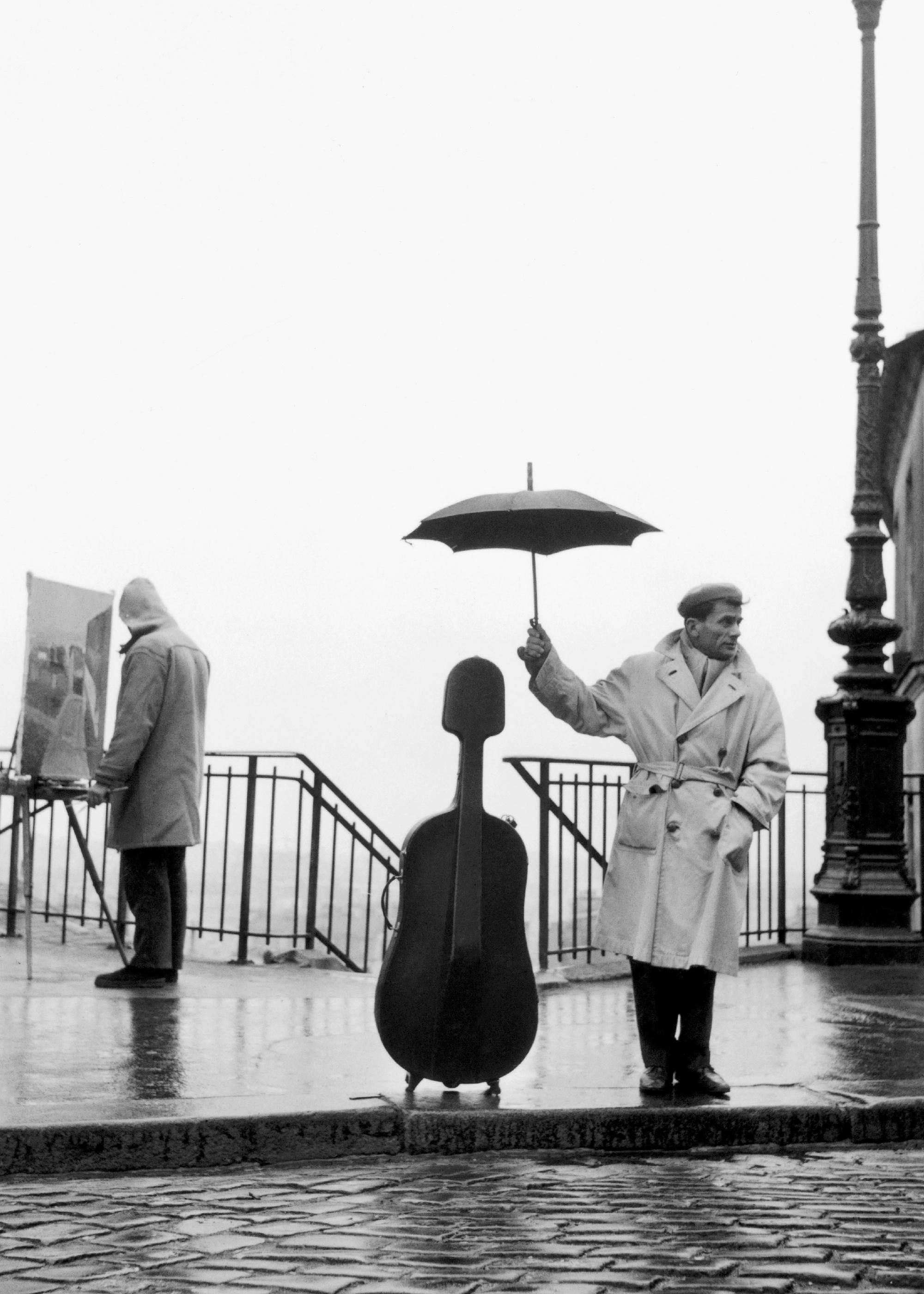 Músico bajo la lluvia Poster 0