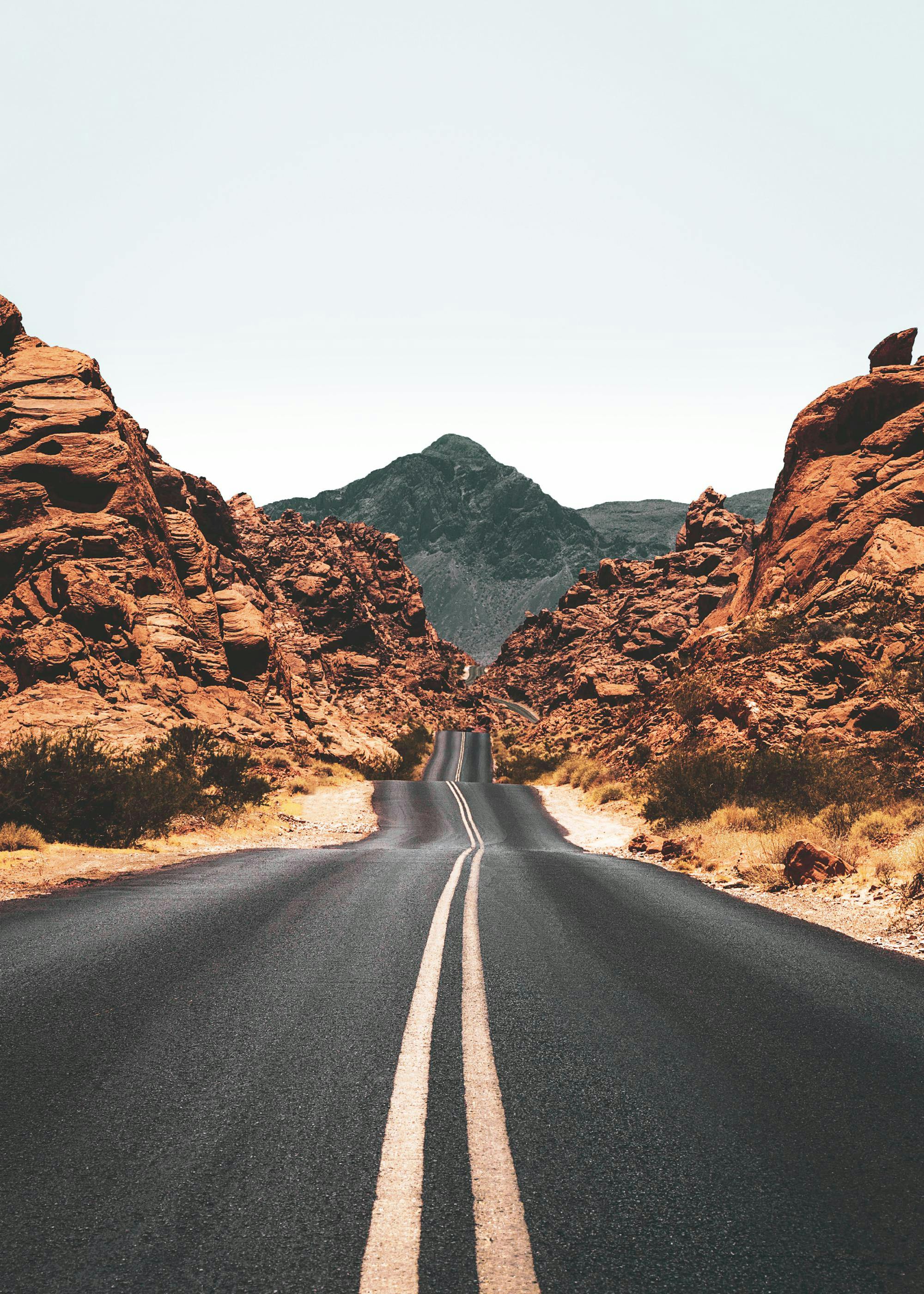Road Through Mountains Poster 0