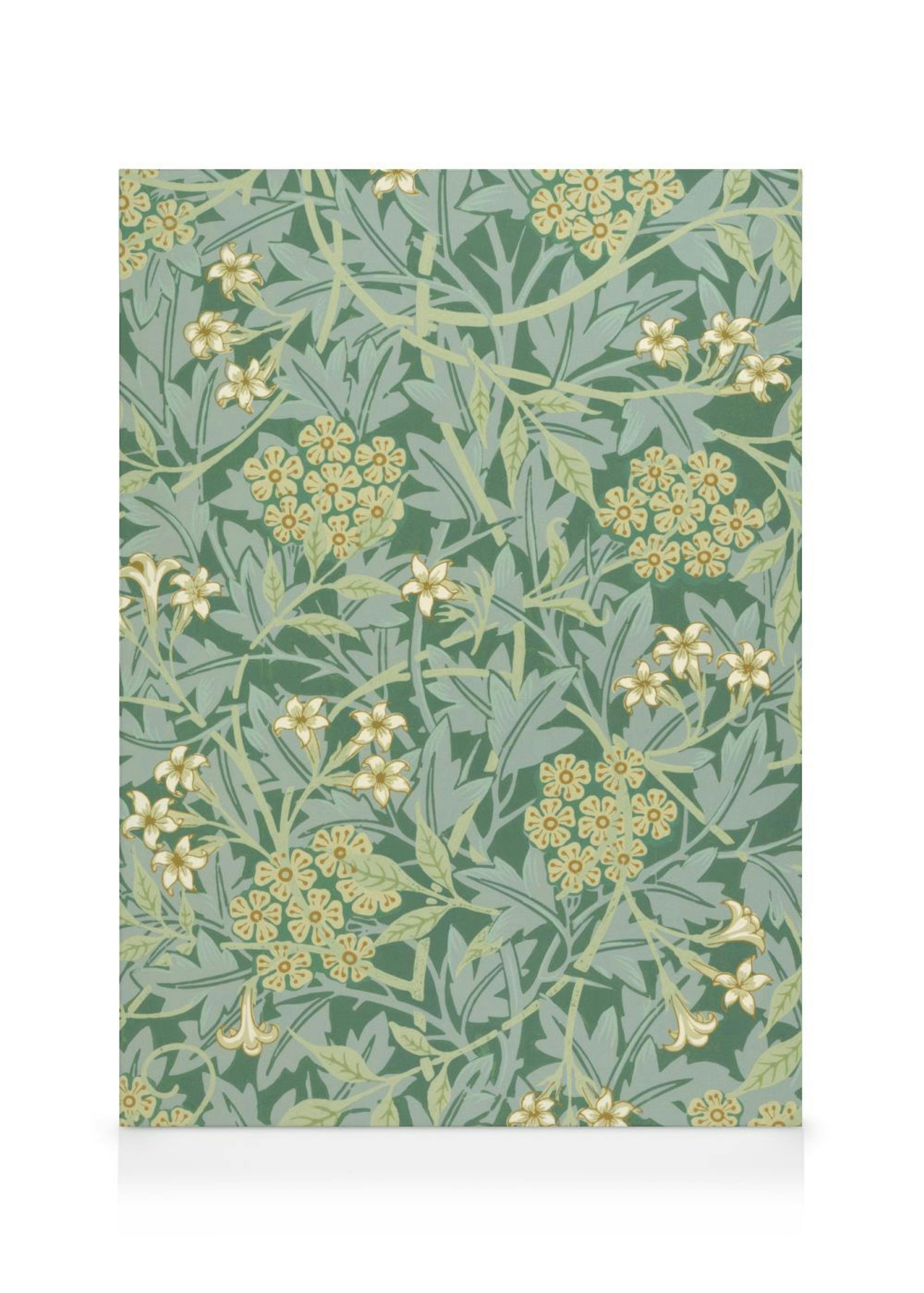 A canvas featuring a floral pattern with green leaves and light yellow flowers on a pale green background.