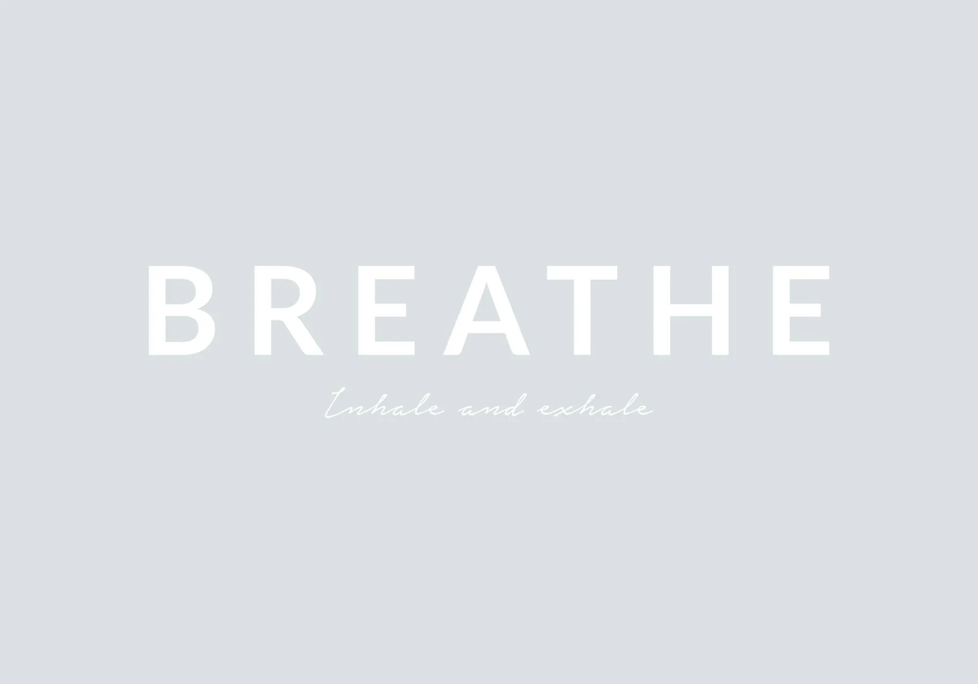 「BREATHE Inhale and exhale」の文字が描かれた、癒やし系のポスター。