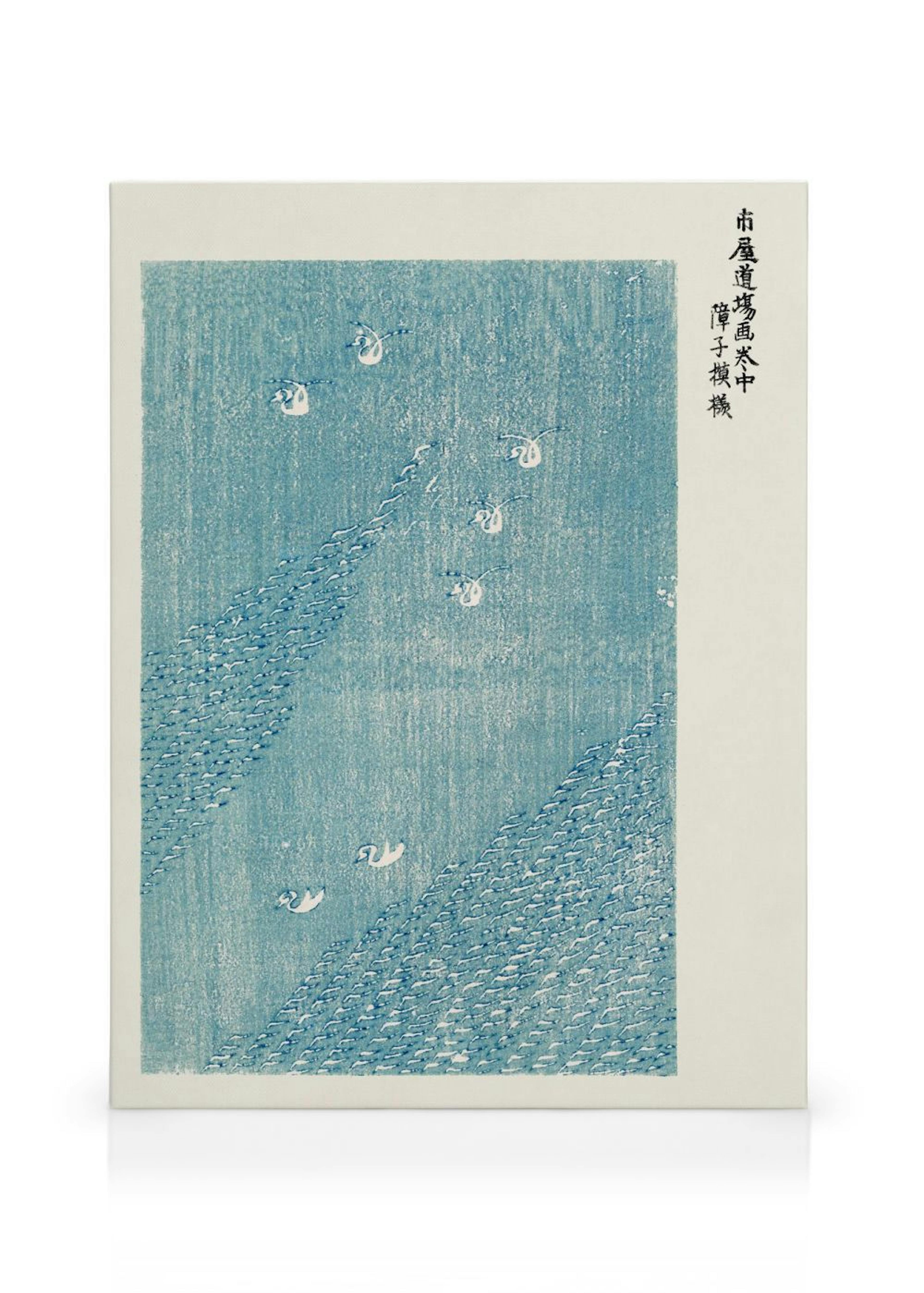 Sinivihreä kanvaasi, jossa on japanilainen puupiirros lumisateesta ja lentävistä joutsenista.