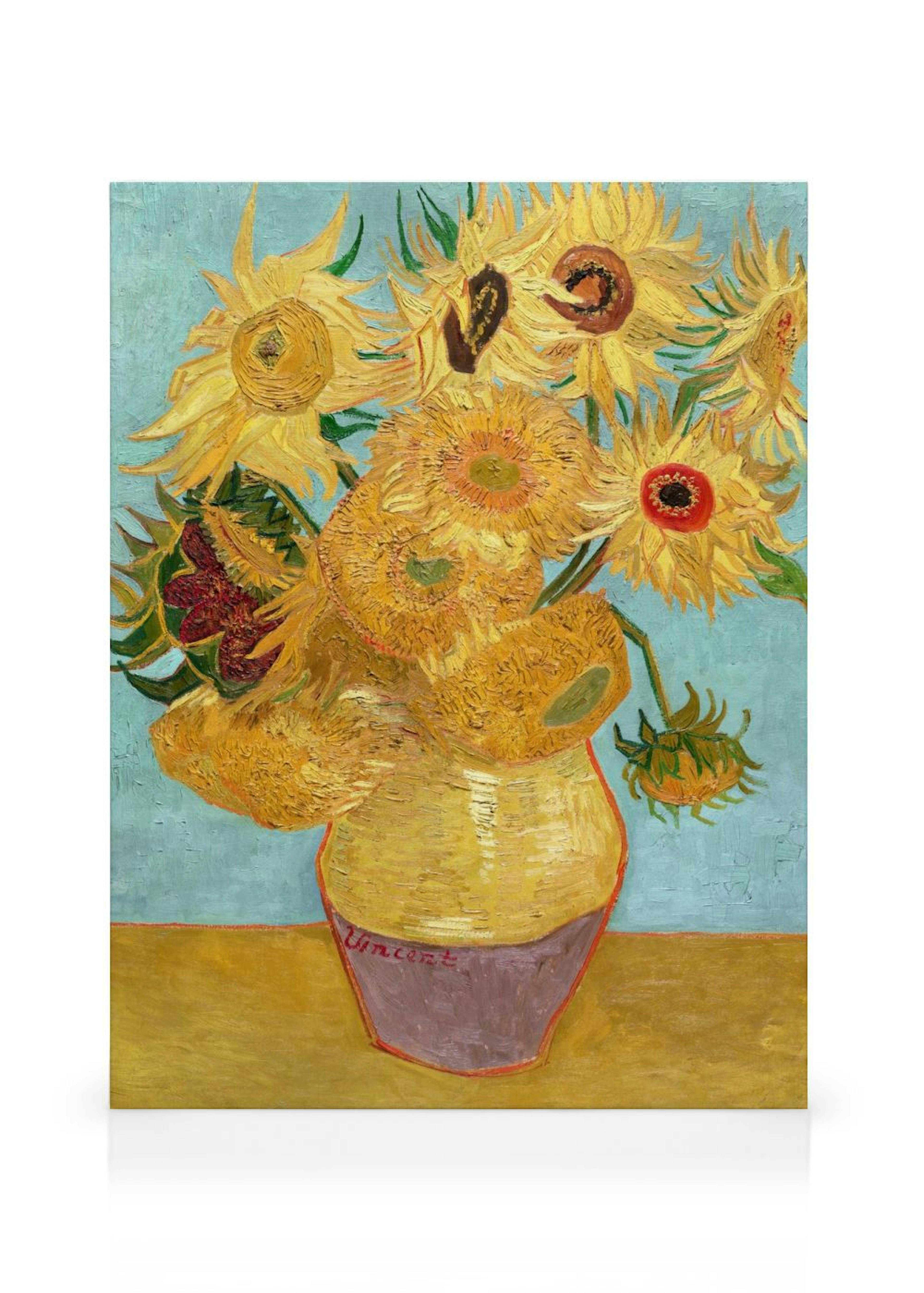 Kanvaasi, jossa on Van Goghin Auringonkukat-maalaus. Keltaisia auringonkukkia vaaleansinisellä taustalla.
