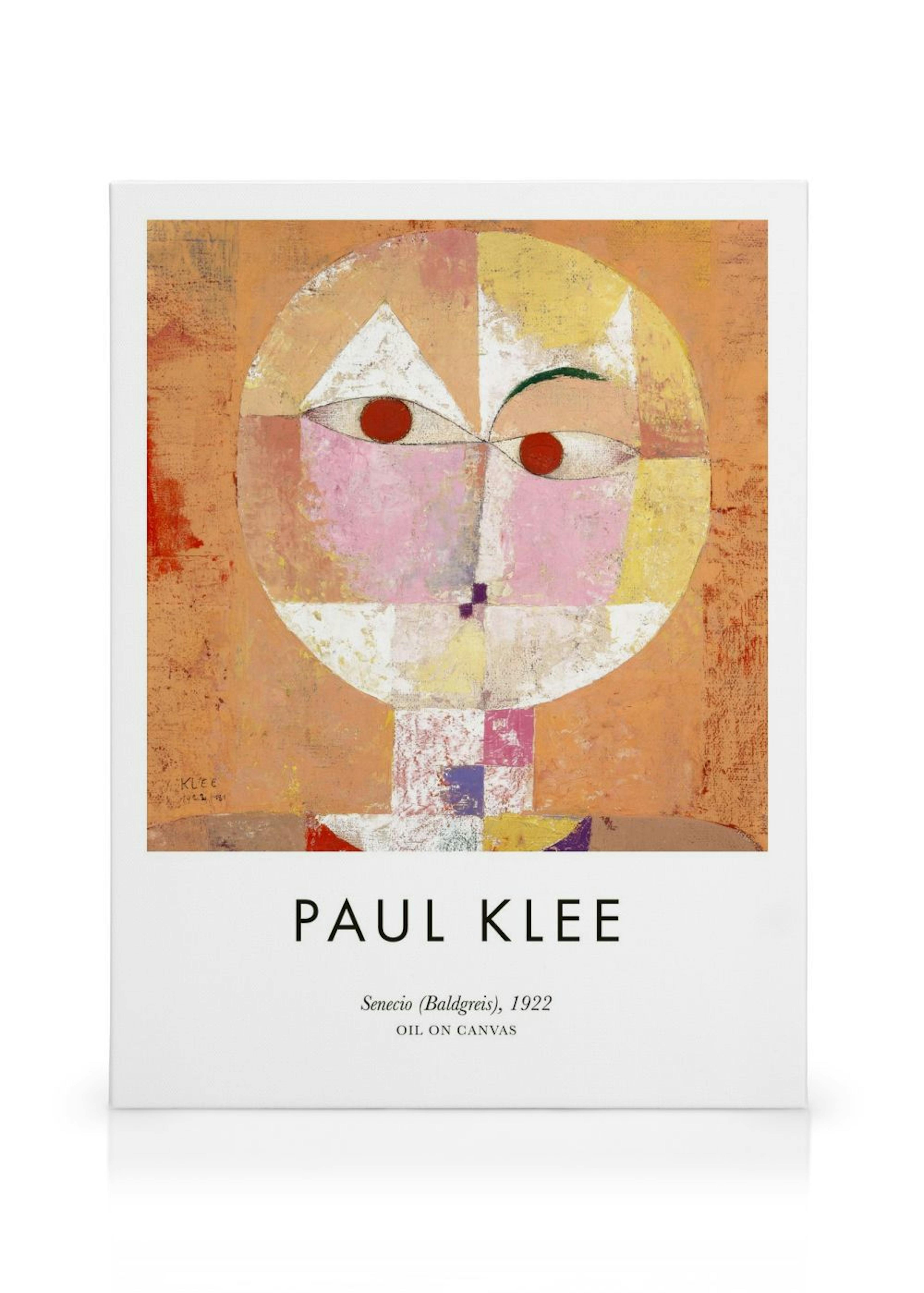 Paul Klee: Senecio-kanvaasi, jossa geometrinen kasvokuva oranssilla taustalla. Kasvoissa on punaiset silmät ja vaaleanpunaisia s