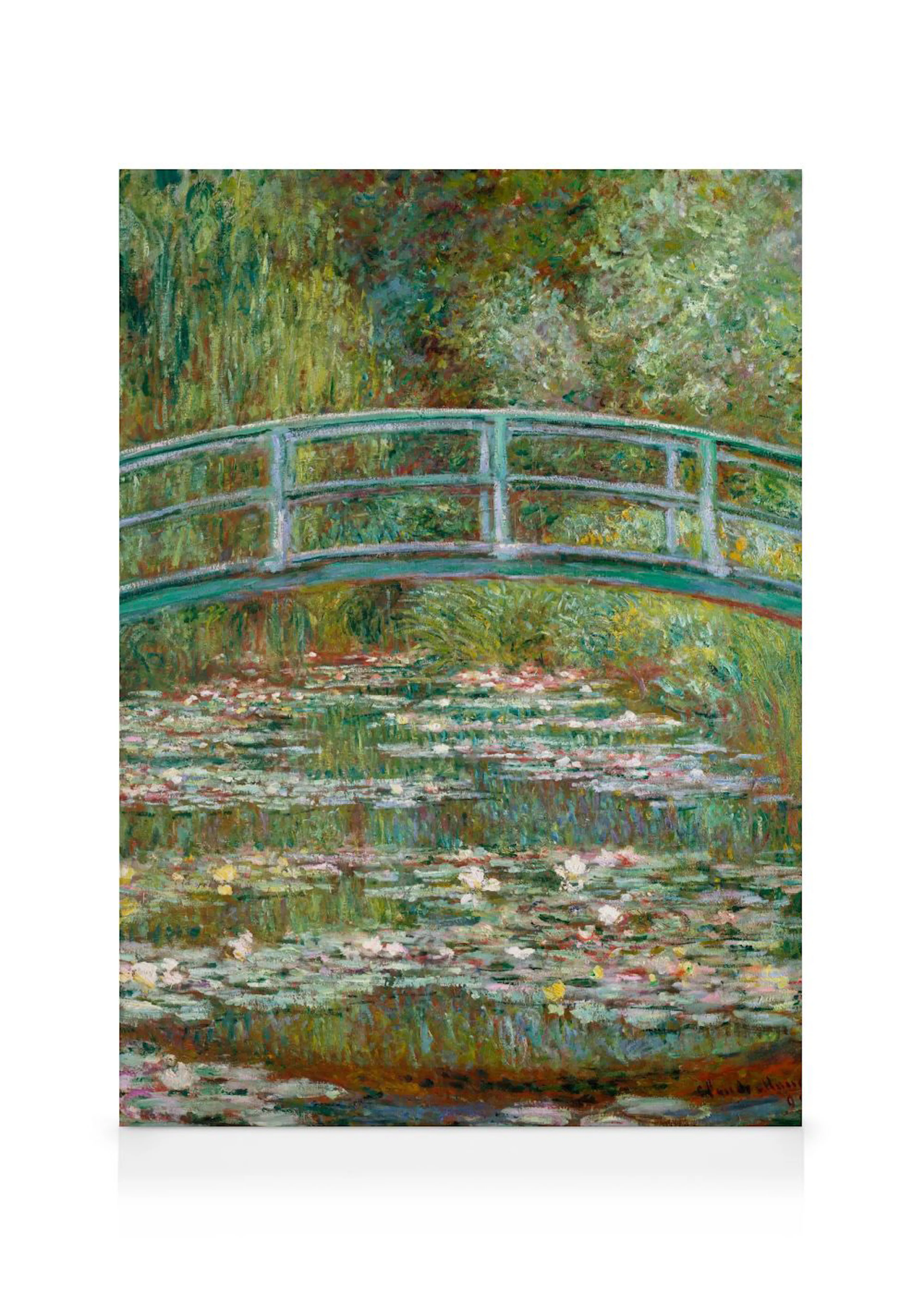 A canvas of Monets Water Lilies and Japanese Bridge painting, featuring a green bridge over a pond filled with water lilies.
