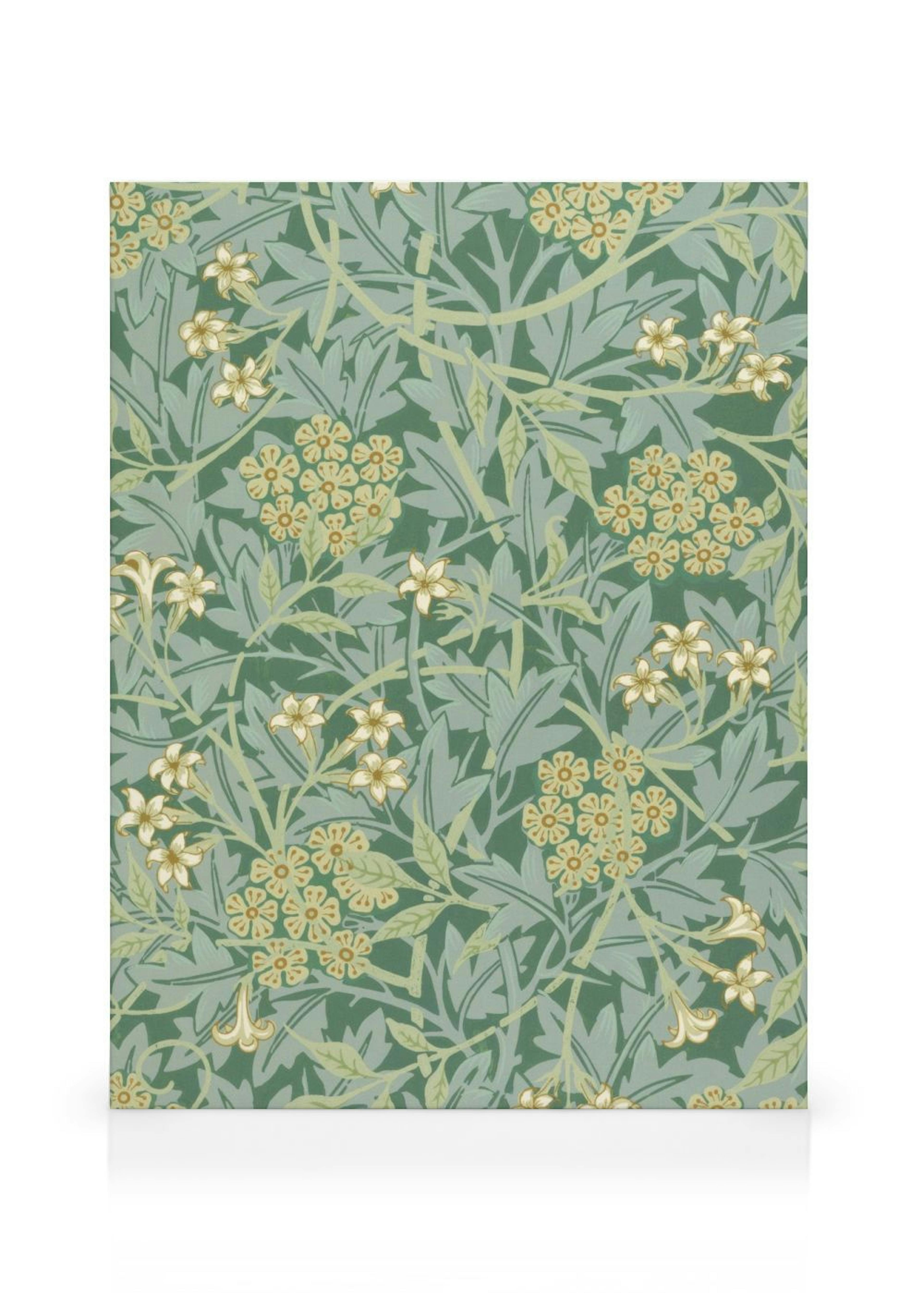 A canvas featuring a floral pattern with green leaves and light yellow flowers on a pale green background.