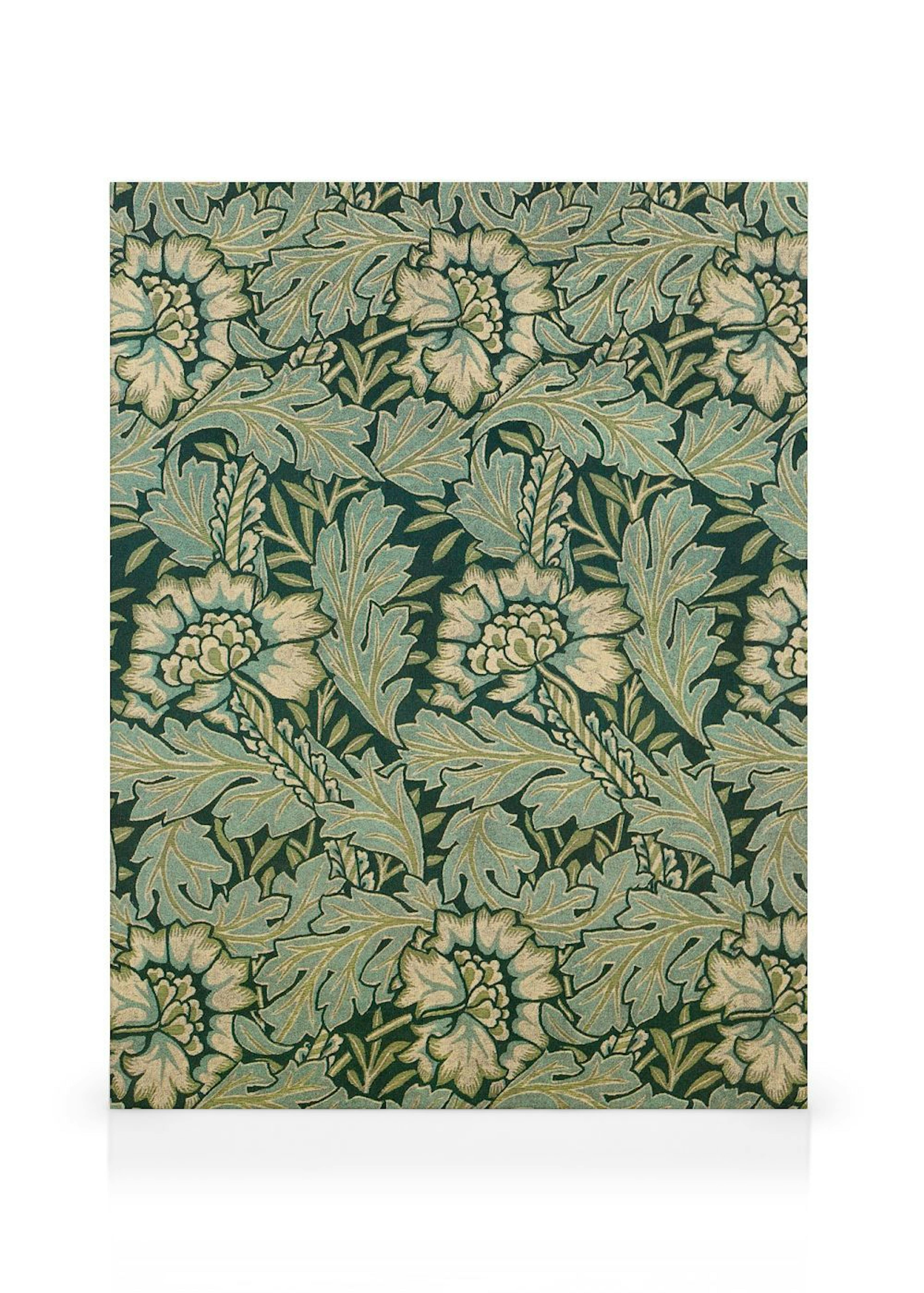 Lienzo con diseño floral de William Morris en tonos azul verde y crema sobre fondo oscuro.