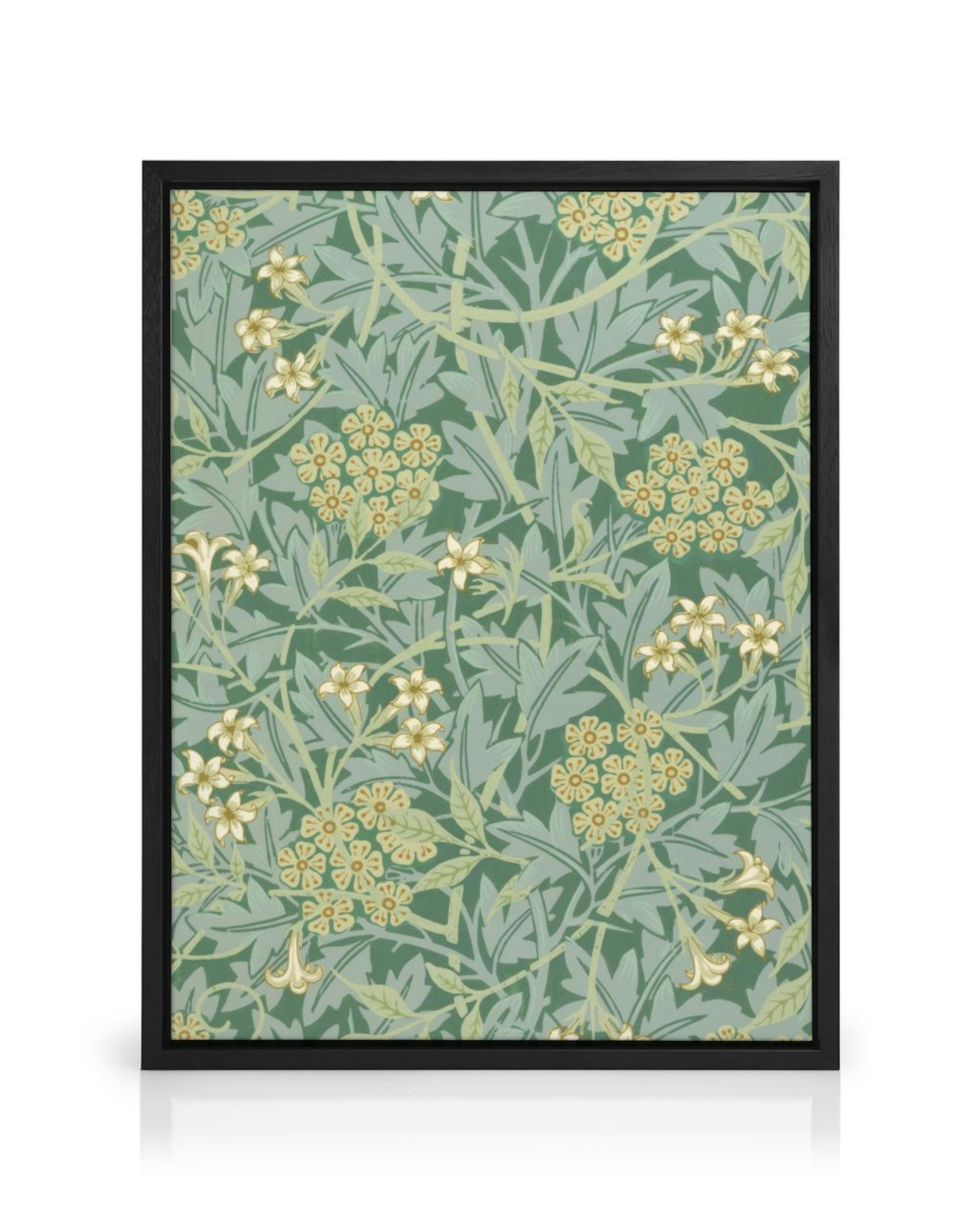 A canvas featuring a detailed botanical pattern of light yellow flowers and green leaves on a dark green background.