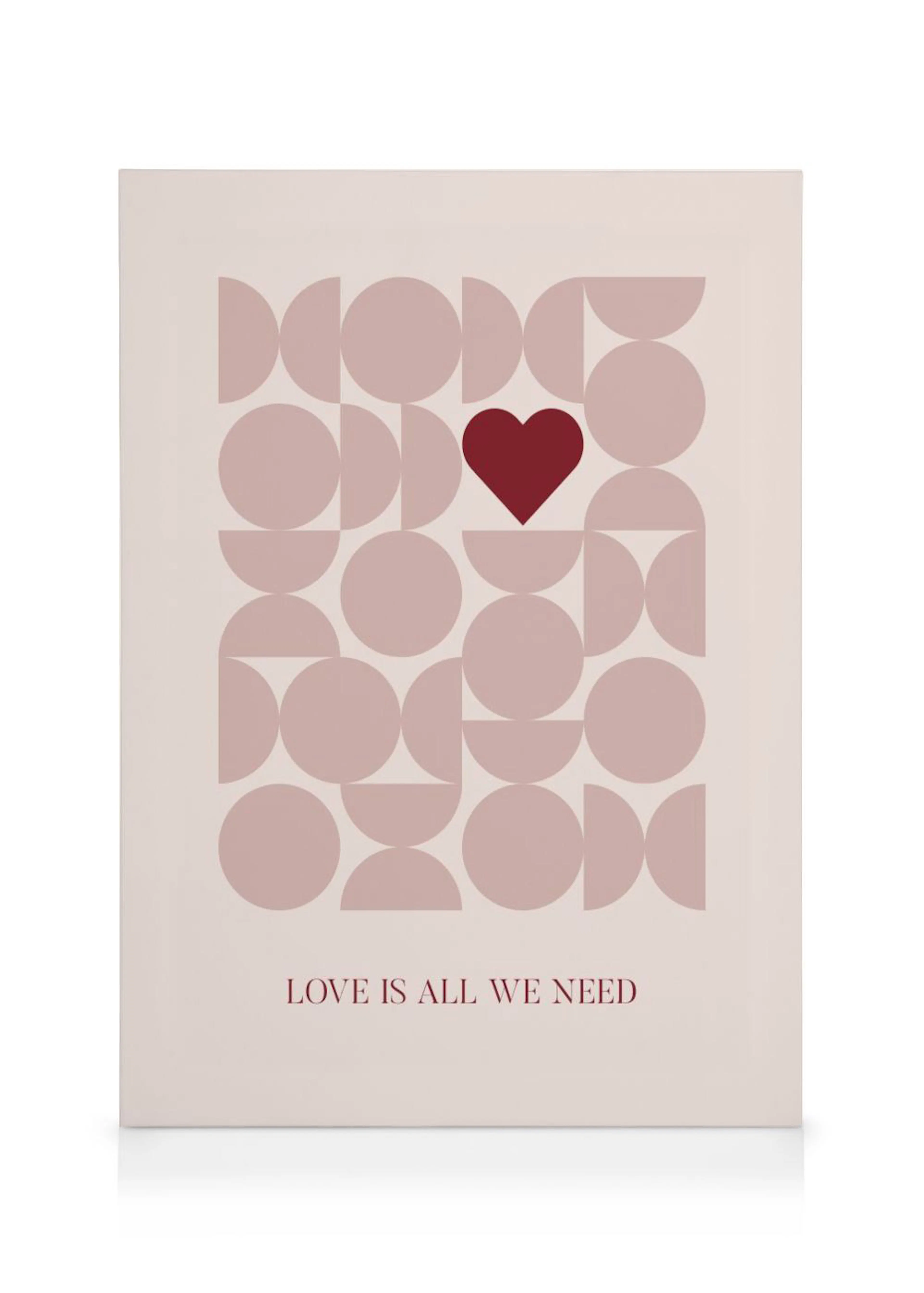 A canvas featuring a red heart surrounded by light pink geometric shapes, with LOVE IS ALL WE NEED text below.