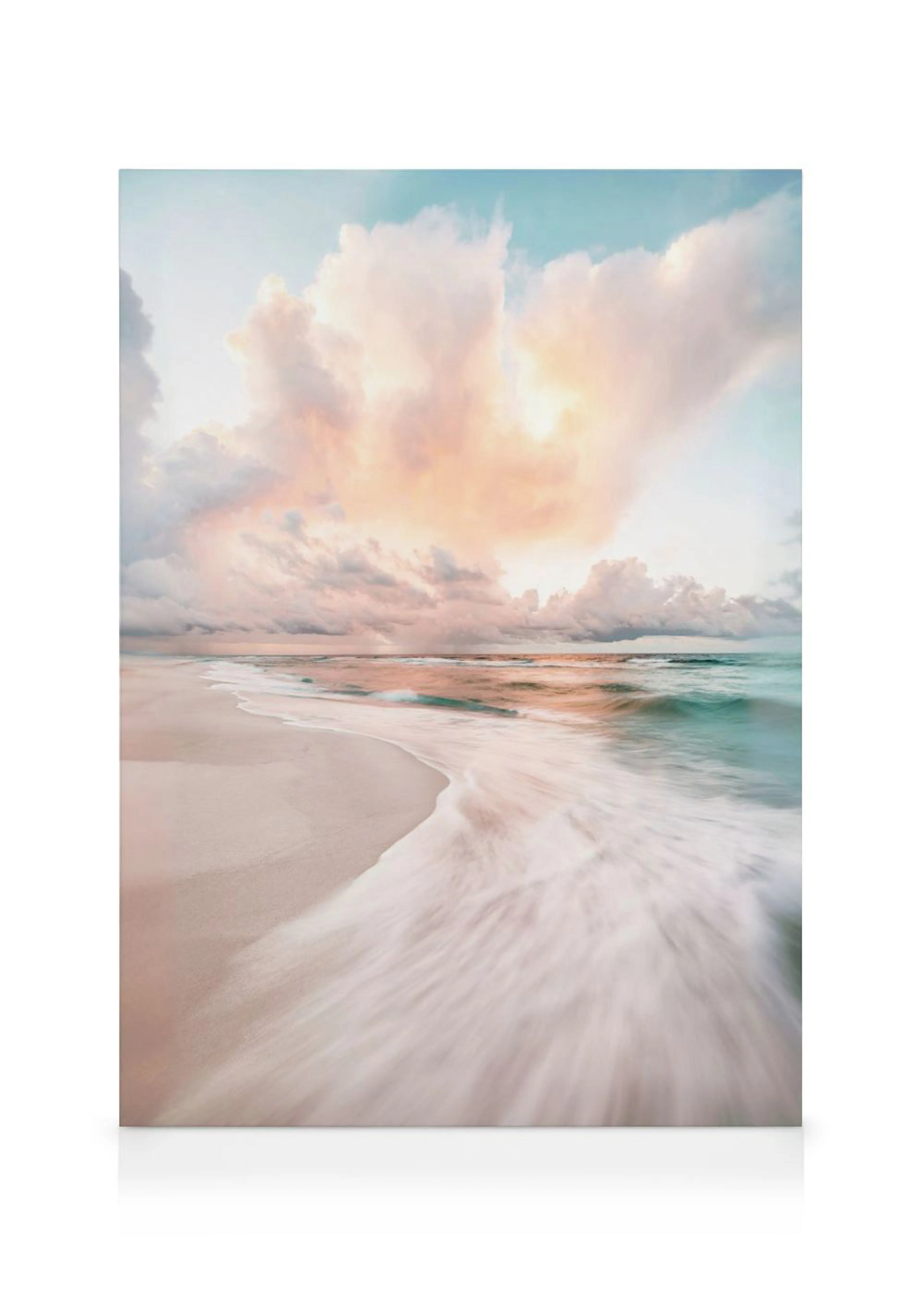A canvas of a serene beach scene with soft pink, orange, and blue clouds over a light sandy shore and blurred ocean waves.