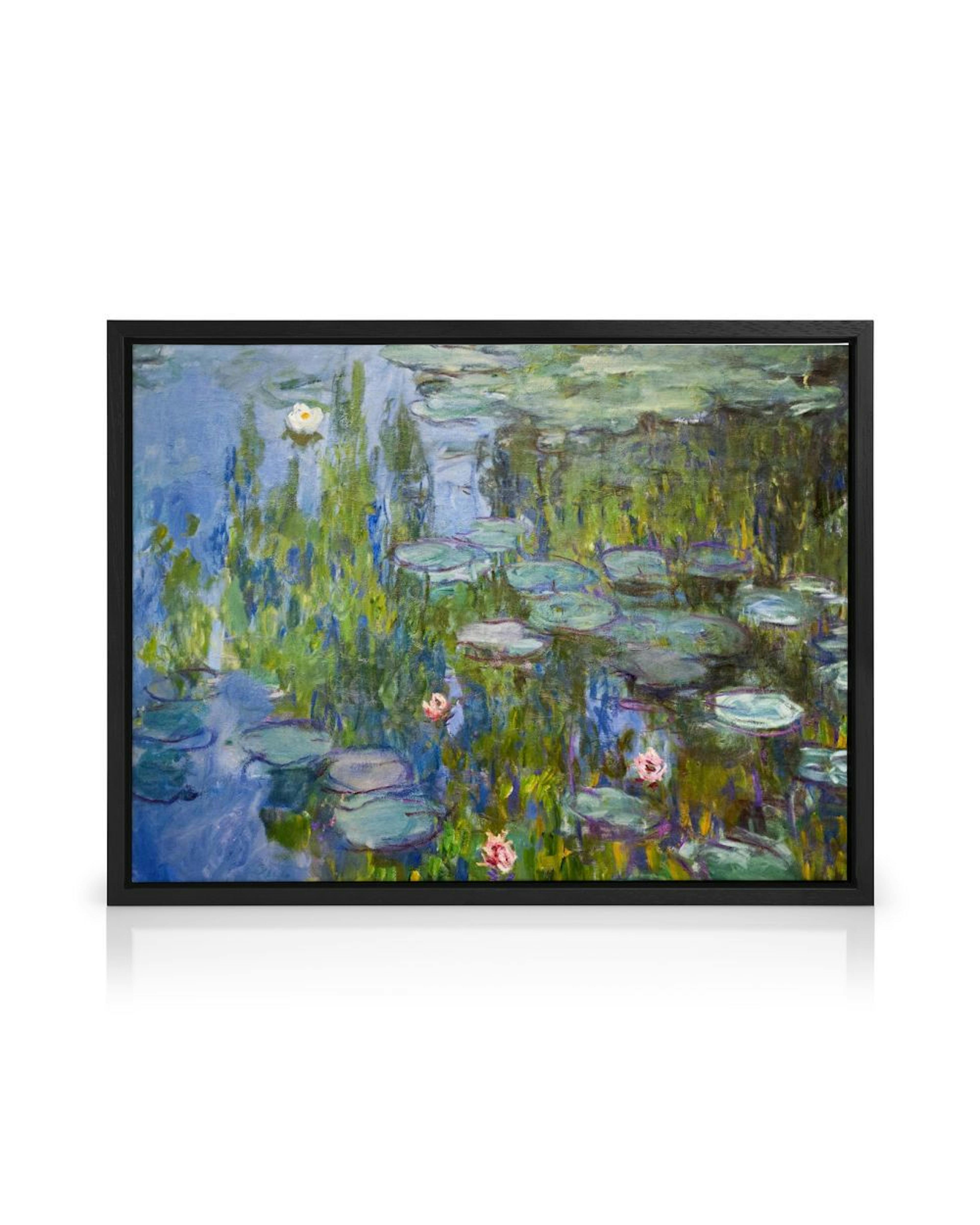 A canvas featuring Monets Water Lilies, with a white and pink lily pad on blue and green water.