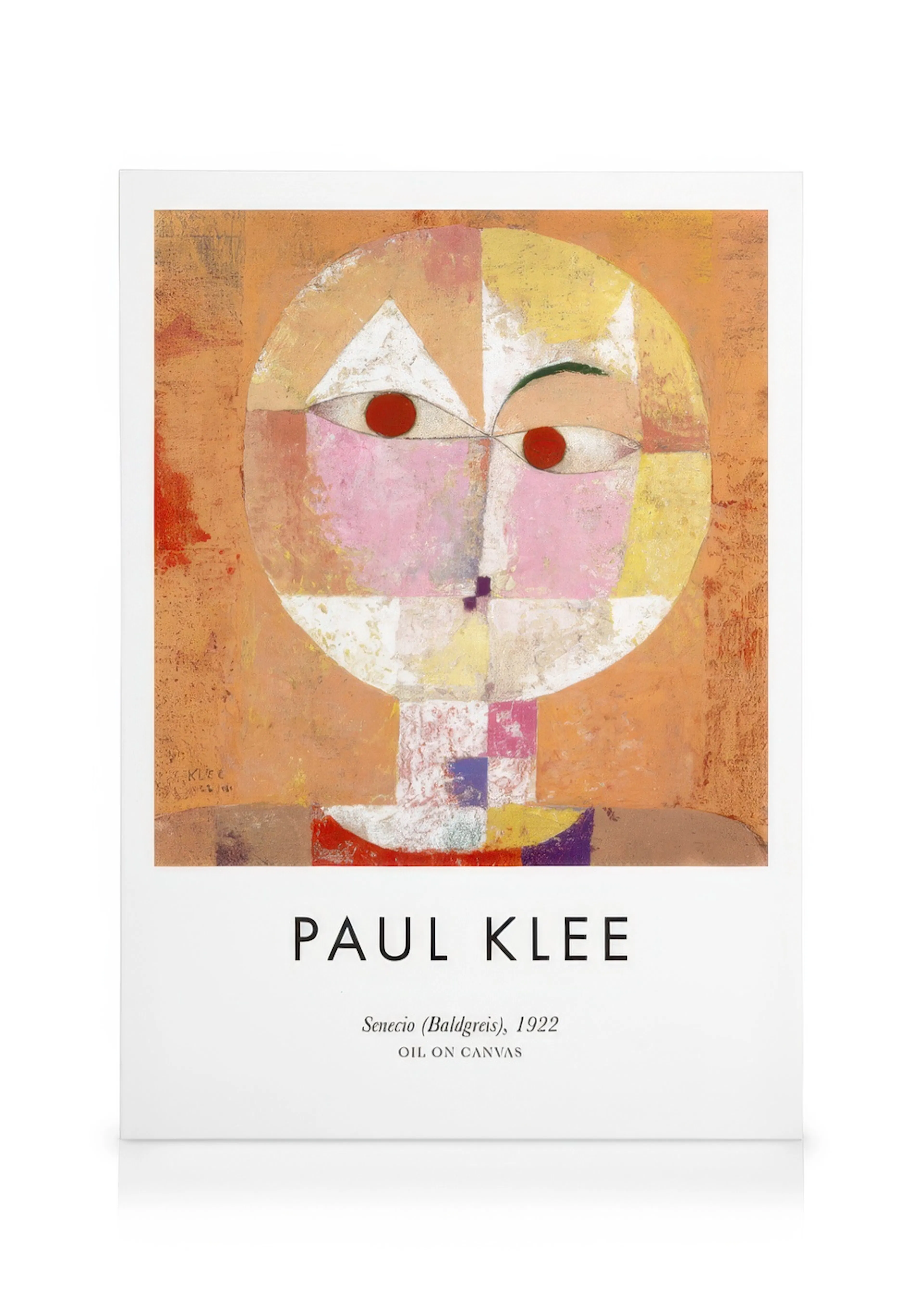 A canvas print of Paul Klees Senecio (Baldgreis), a cubist portrait with a segmented face in warm colours.