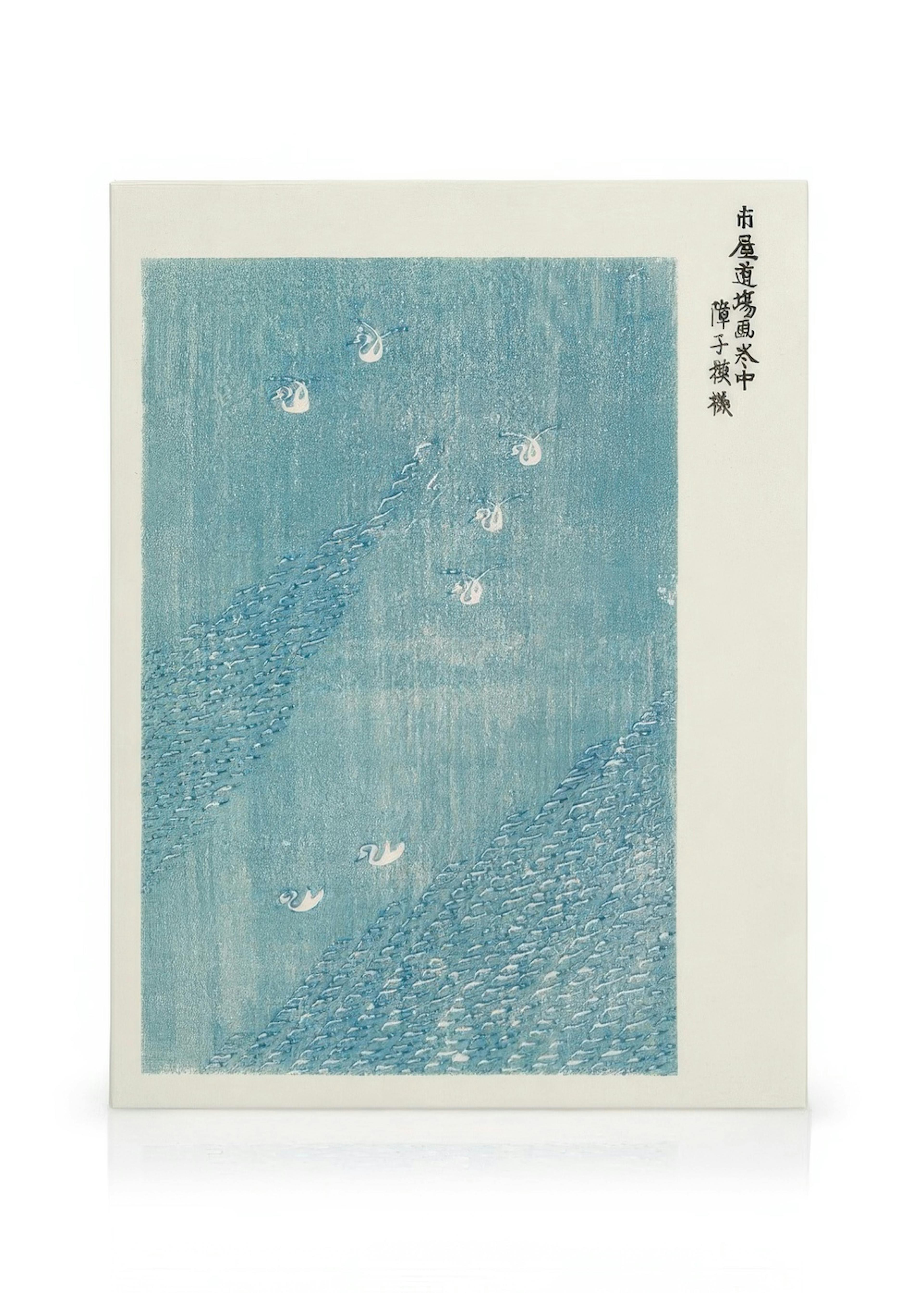Leinwandbild mit einem japanischen Motiv in Blau, das weiße Vögel über Wasserwellen zeigt.