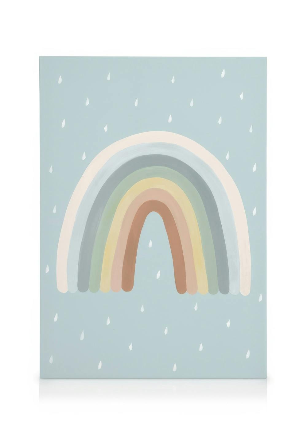 Toile pour enfant : arc-en-ciel aux couleurs pastel sur fond bleu pâle avec des gouttes de pluie banches.