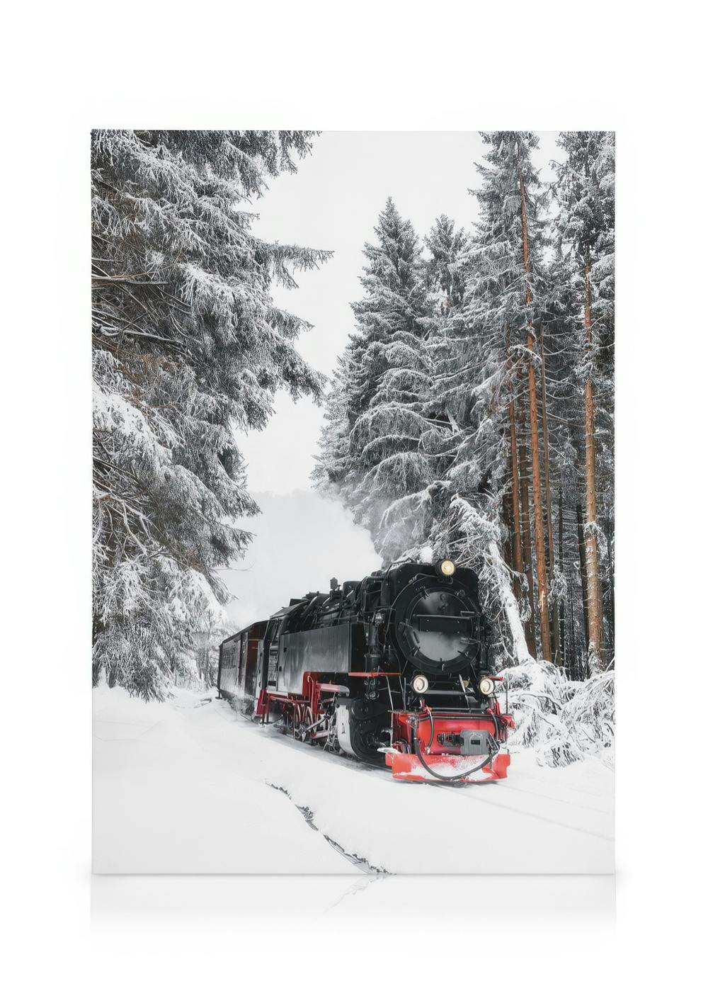 A canvas showing a black steam locomotive with red accents on tracks in a snow-covered forest of pine trees.