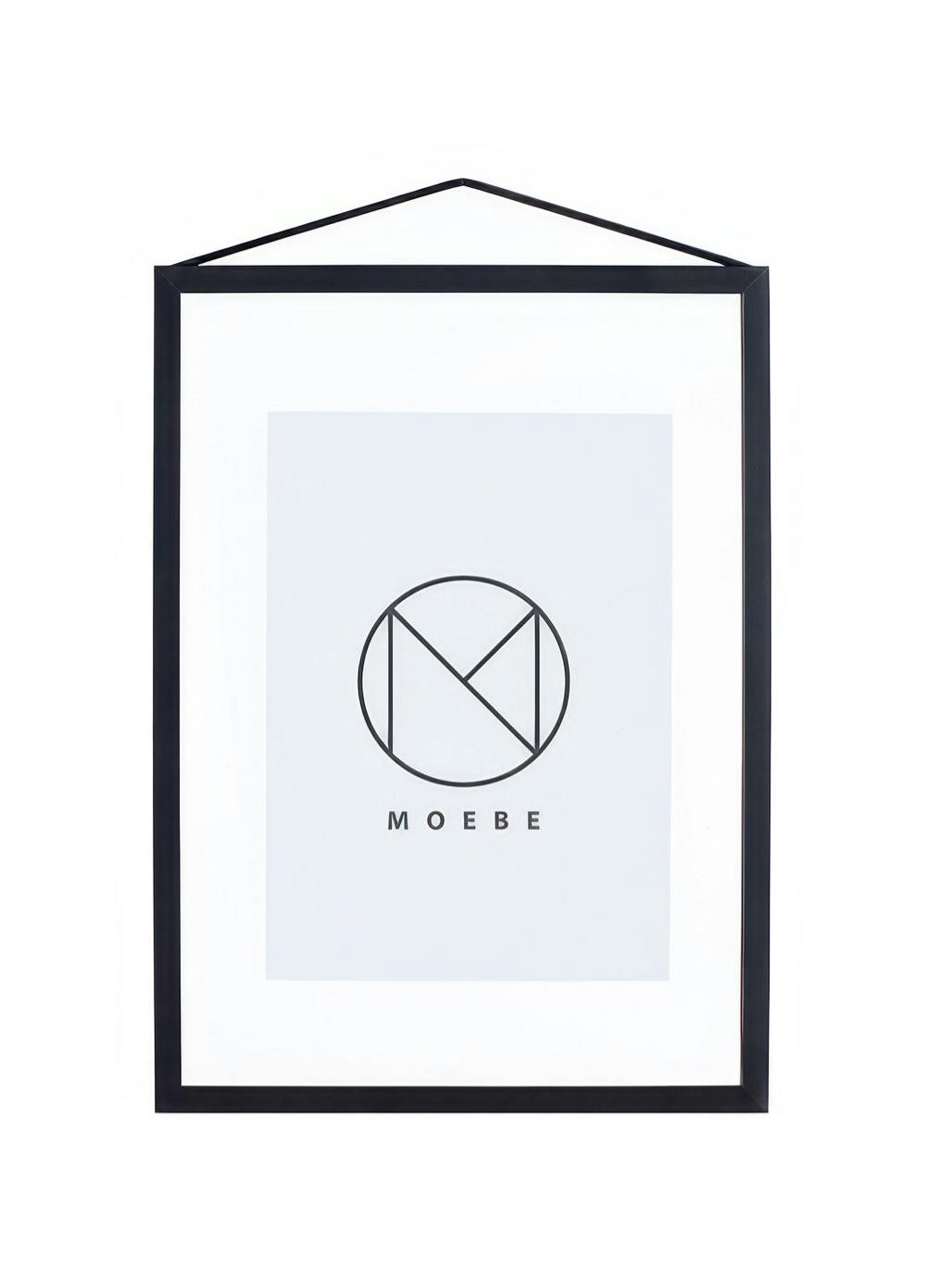 A poster with a minimalist black and white design featuring a circular logo with geometric lines forming an M and an E, and the