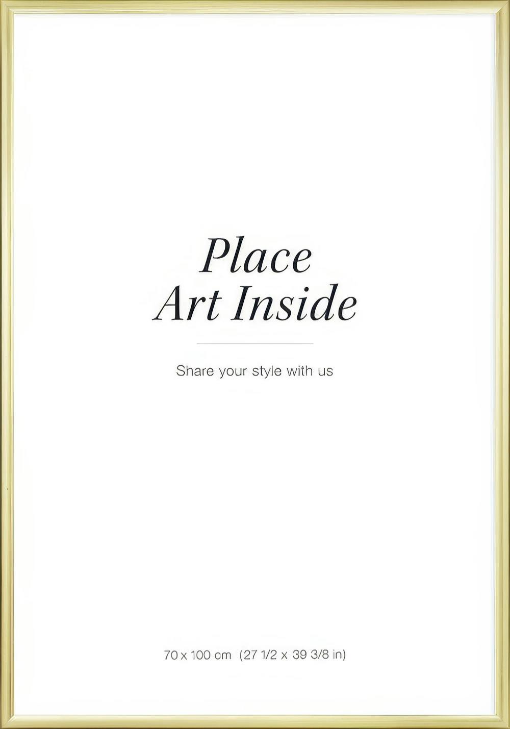 A poster with a gold frame and a white center displaying the text Place Art Inside.