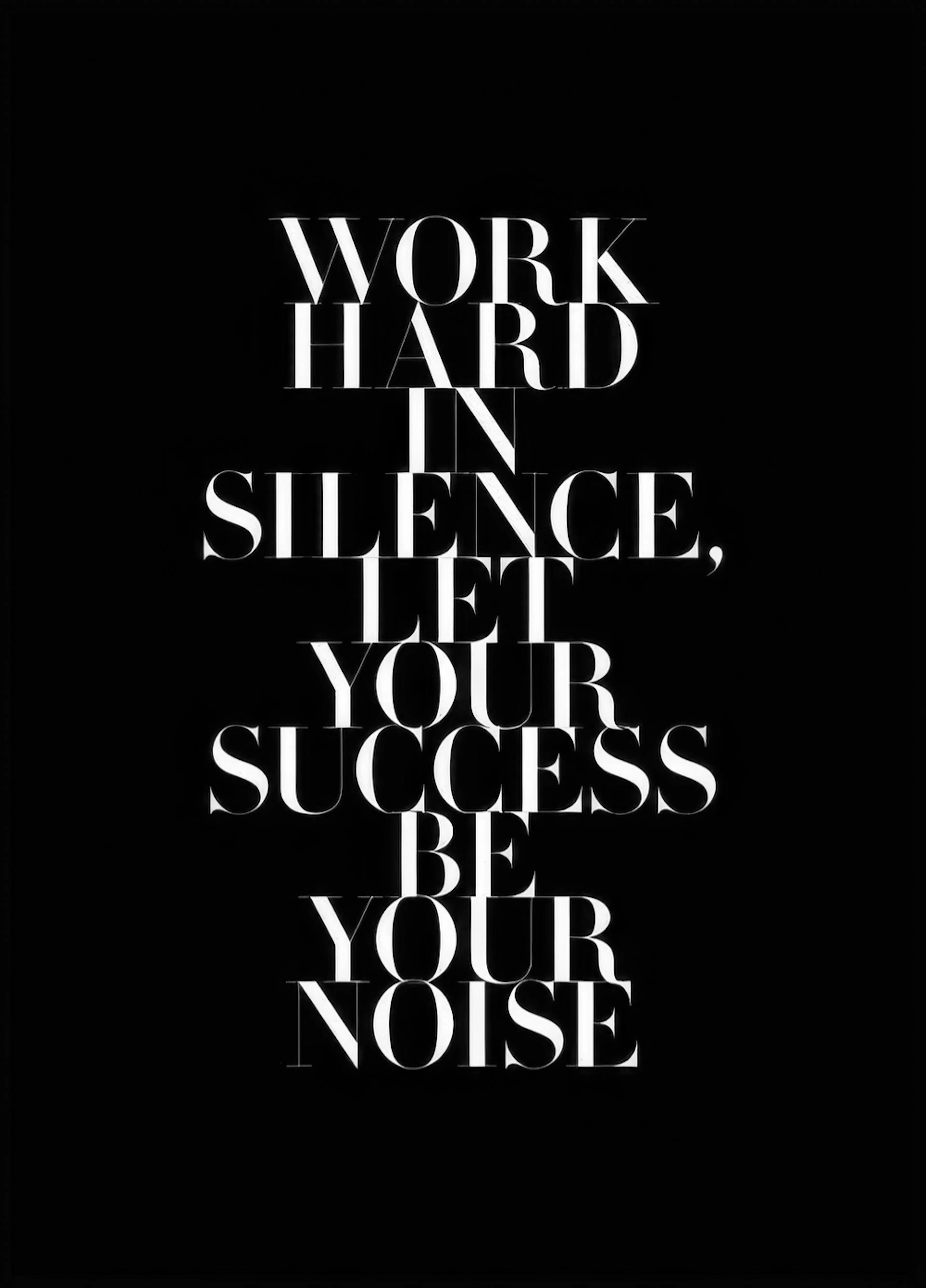 A motivational poster with the quote WORK HARD IN SILENCE, LET YOUR SUCCESS BE YOUR NOISE in white text on a black background.