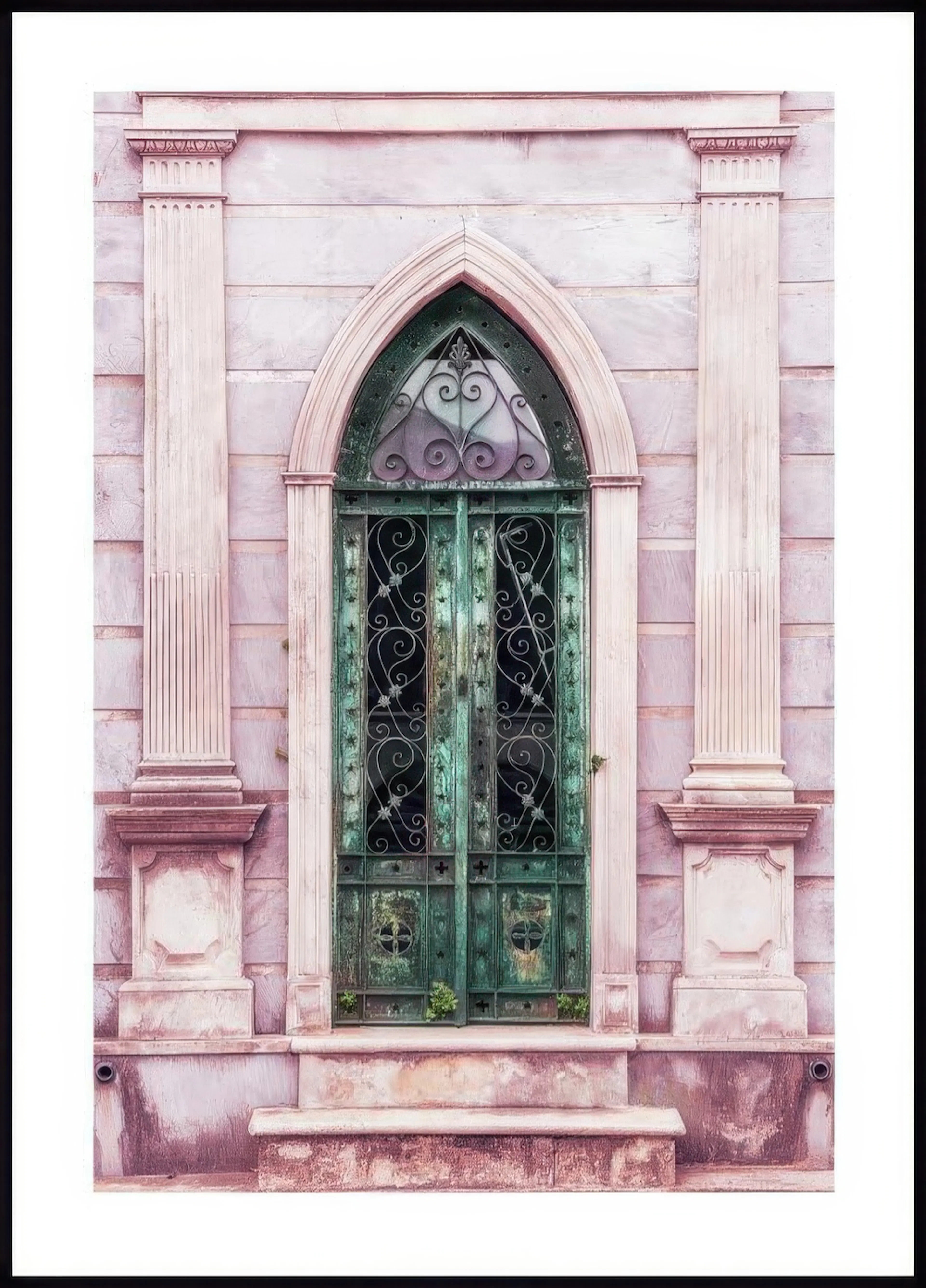 A poster of an aged green ornate door with an arched top and intricate metalwork, flanked by two pink marble pillars.