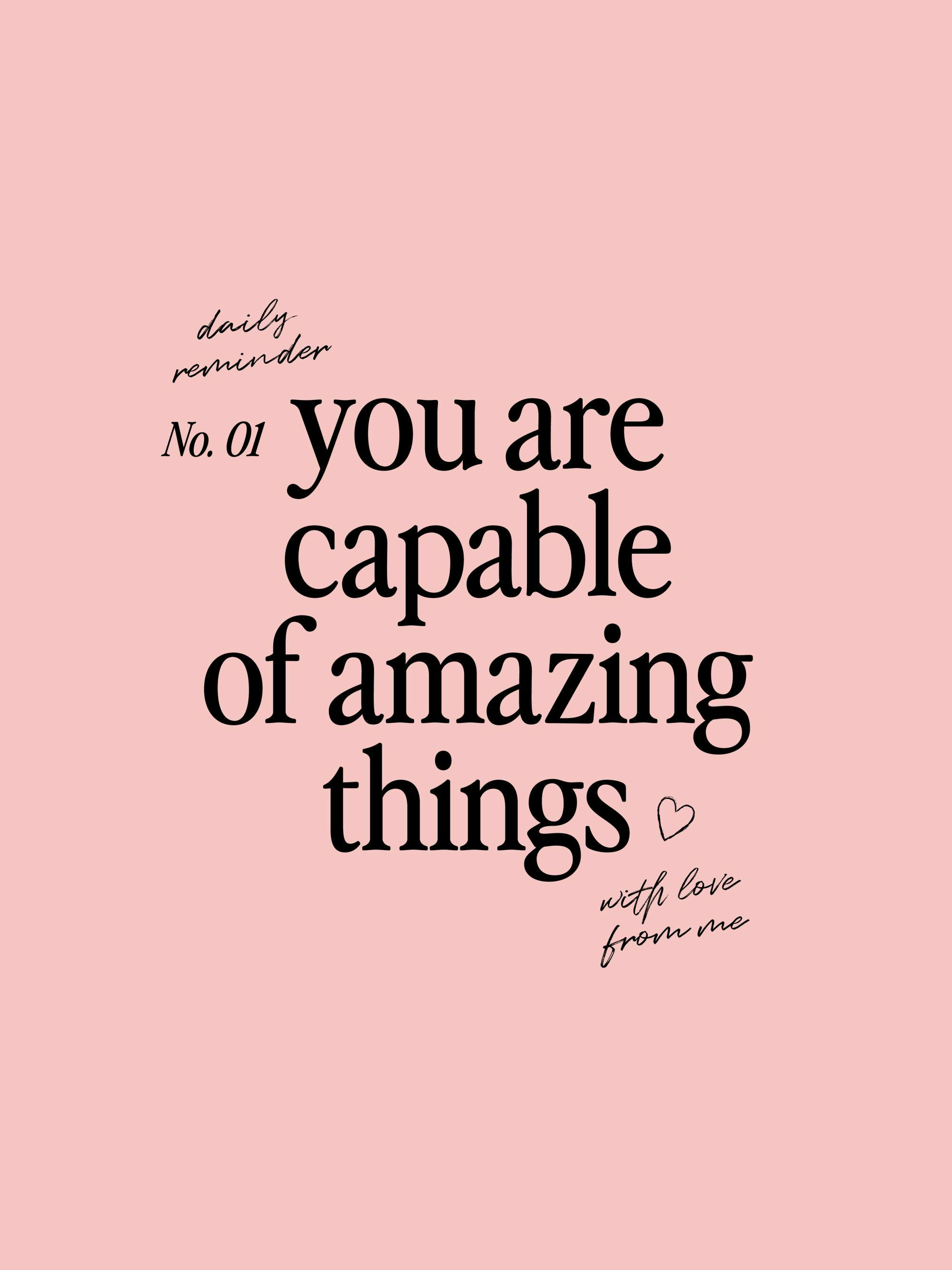 Un poster rosa con la scritta nera you are capable of amazing things e daily reminder No. 01 con un cuore.