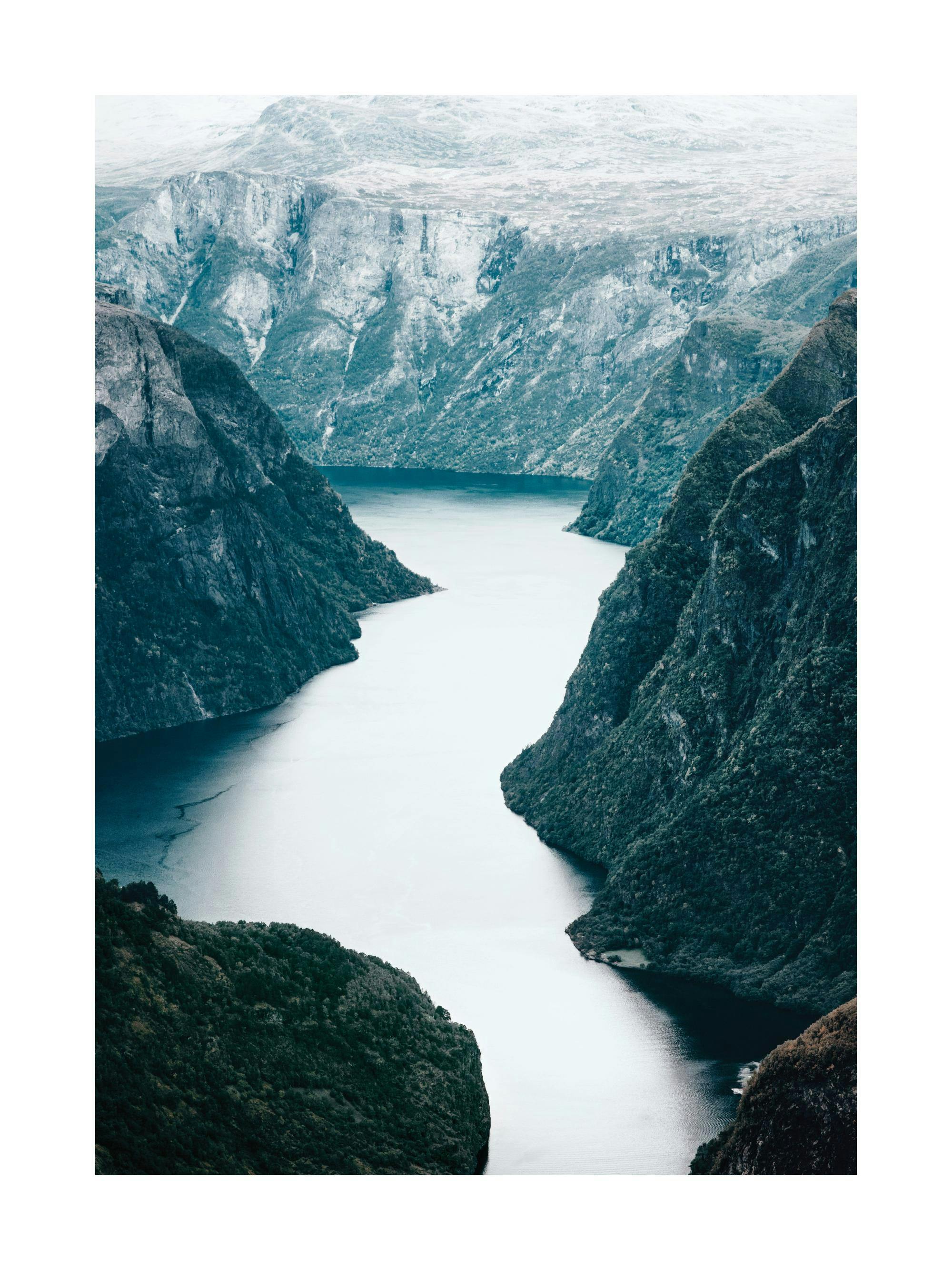 A poster depicting a serene fjord with dark, steep mountainsides flanking a calm, reflective body of water.