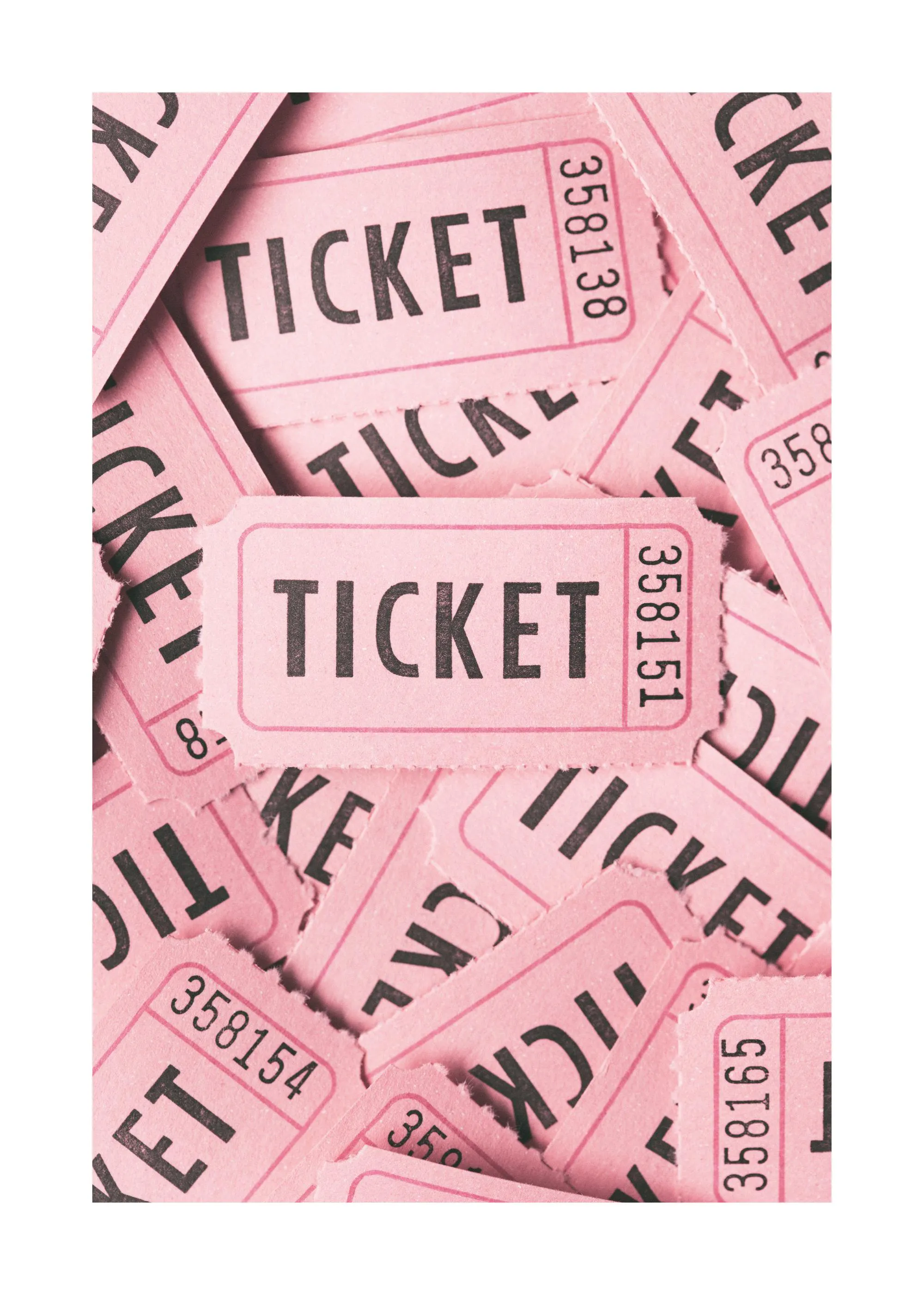 A poster featuring a close-up of many pink raffle tickets, with the word TICKET prominently displayed on several.