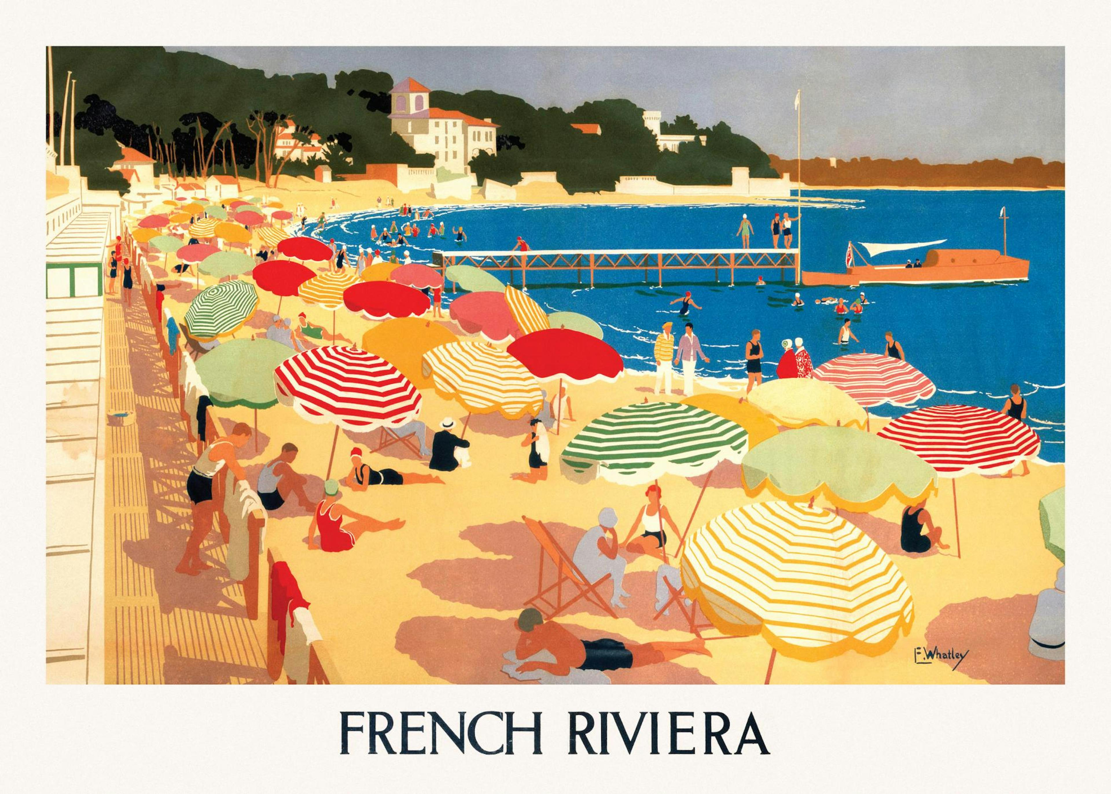 Póster de una playa con sombrillas de colores y bañistas, con el texto French Riviera, colgado sobre un mueble negro con jarrone