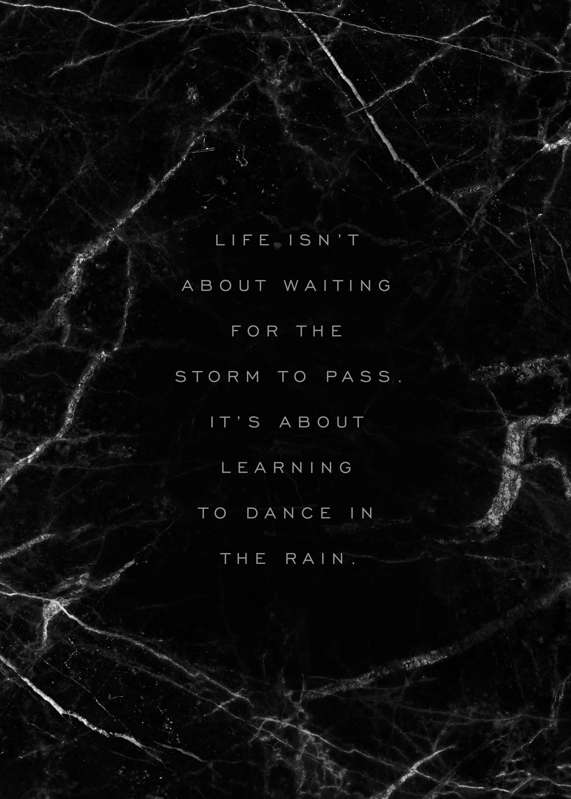 Musta marmorikuvioinen juliste, jossa valkoinen teksti: LIFE ISNT ABOUT WAITING FOR THE STORM TO PASS. ITS ABOUT LEARNING TO DAN