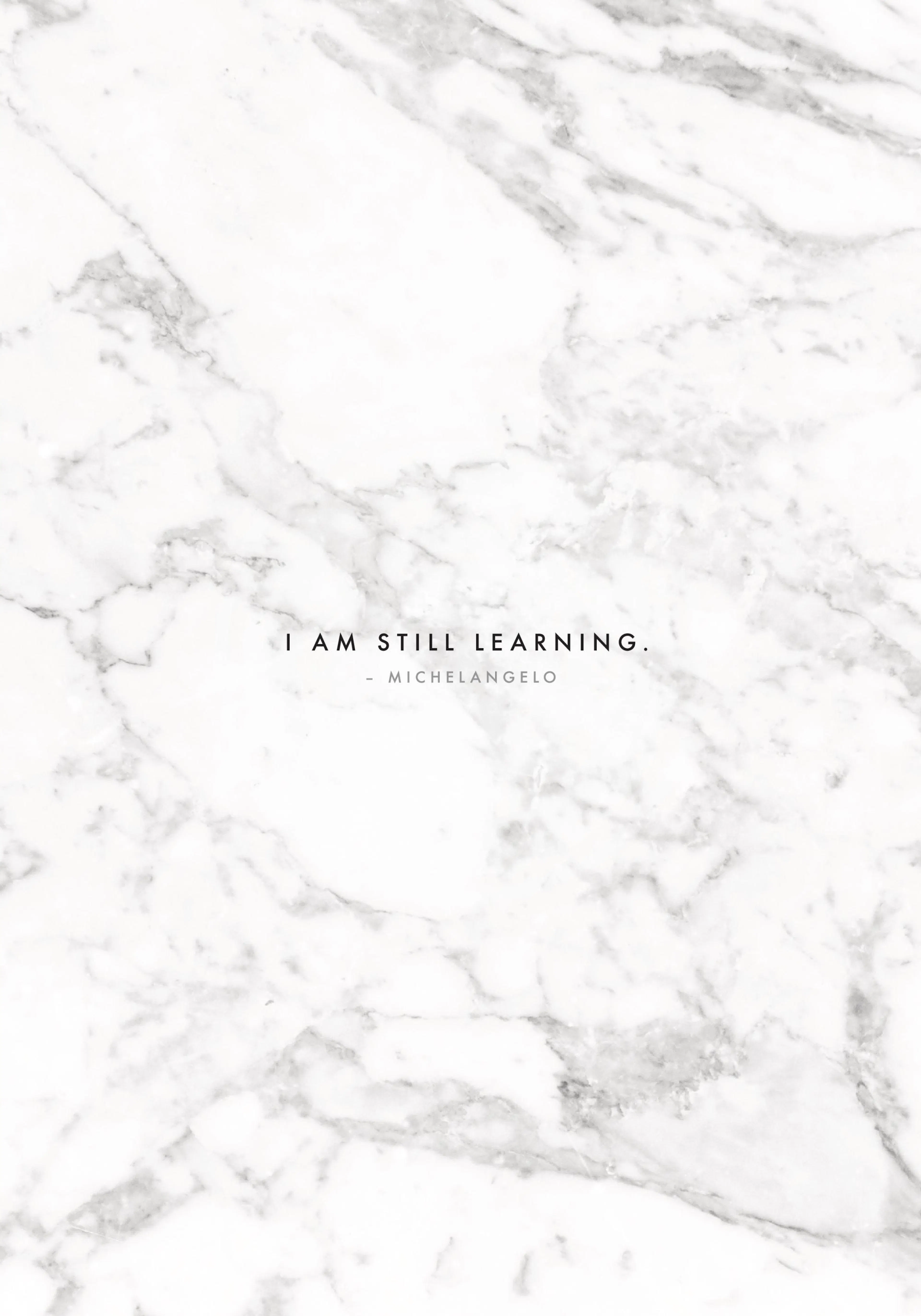 A poster featuring a white marble background with natural grey veins, and the quote I AM STILL LEARNING from Michelangelo.