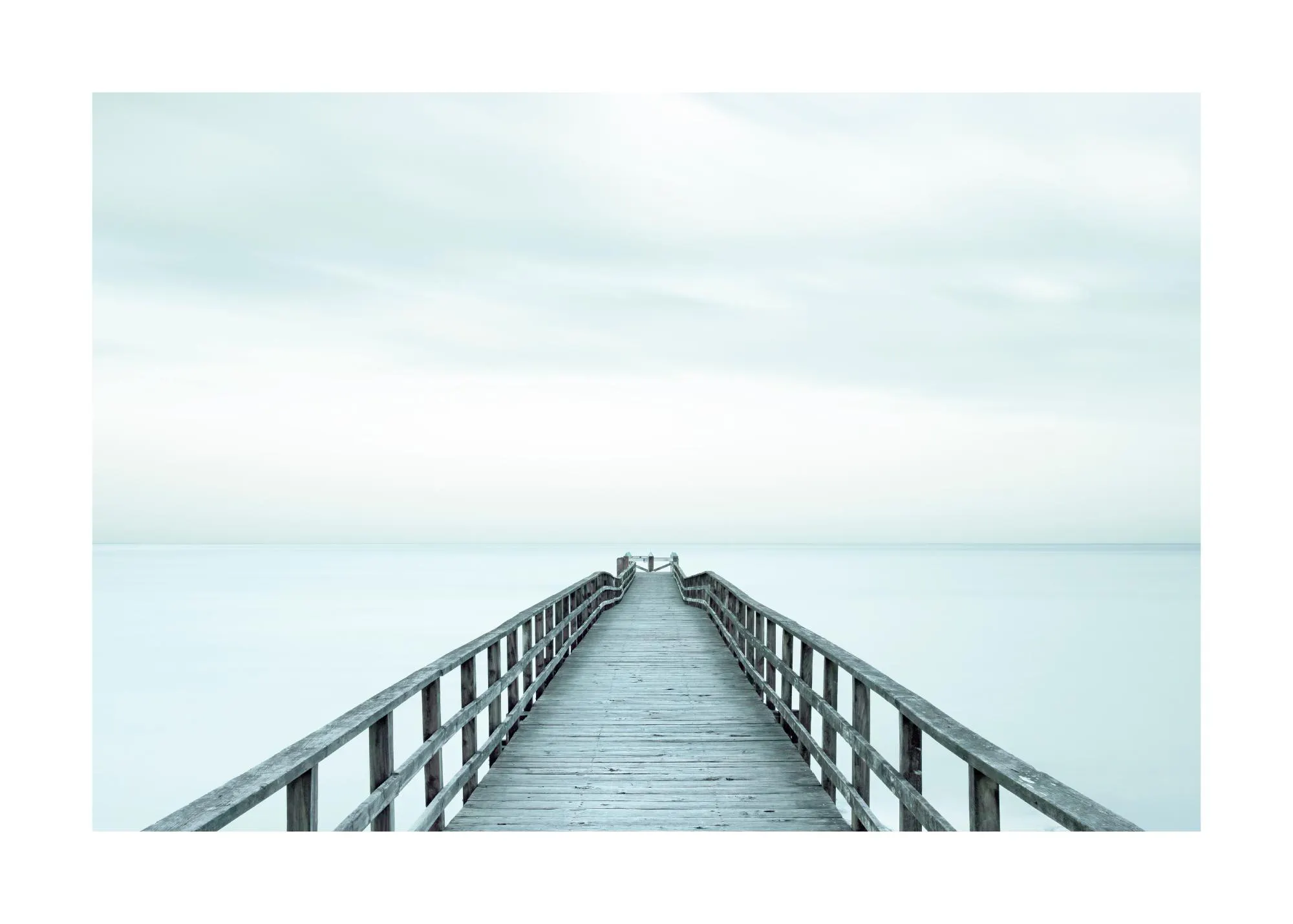 A minimalist poster of a wooden pier extending into calm, light blue water under a pale, serene sky.