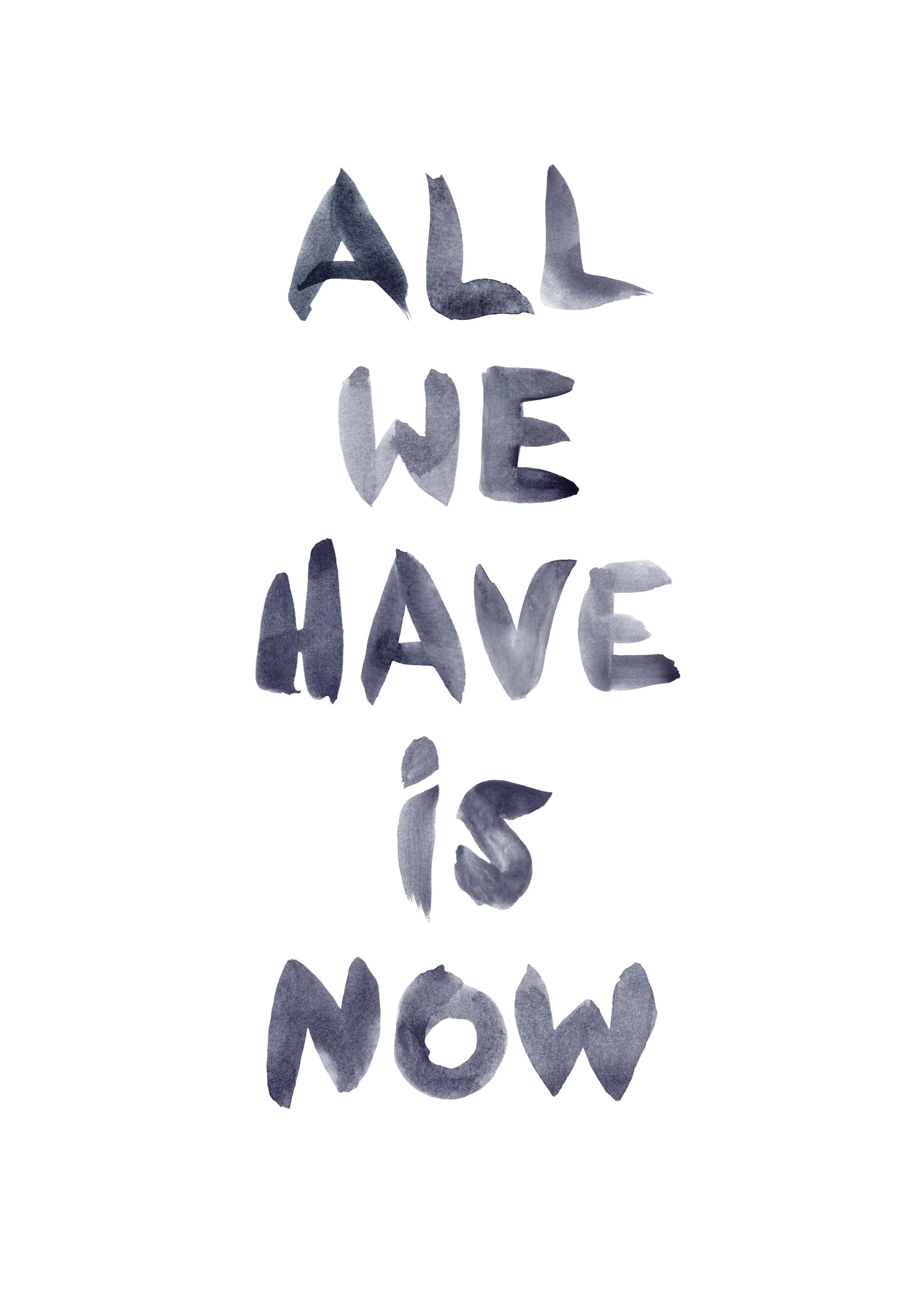 A poster featuring the phrase ALL WE HAVE IS NOW in dark grey, brushstroke-style lettering on a white background.