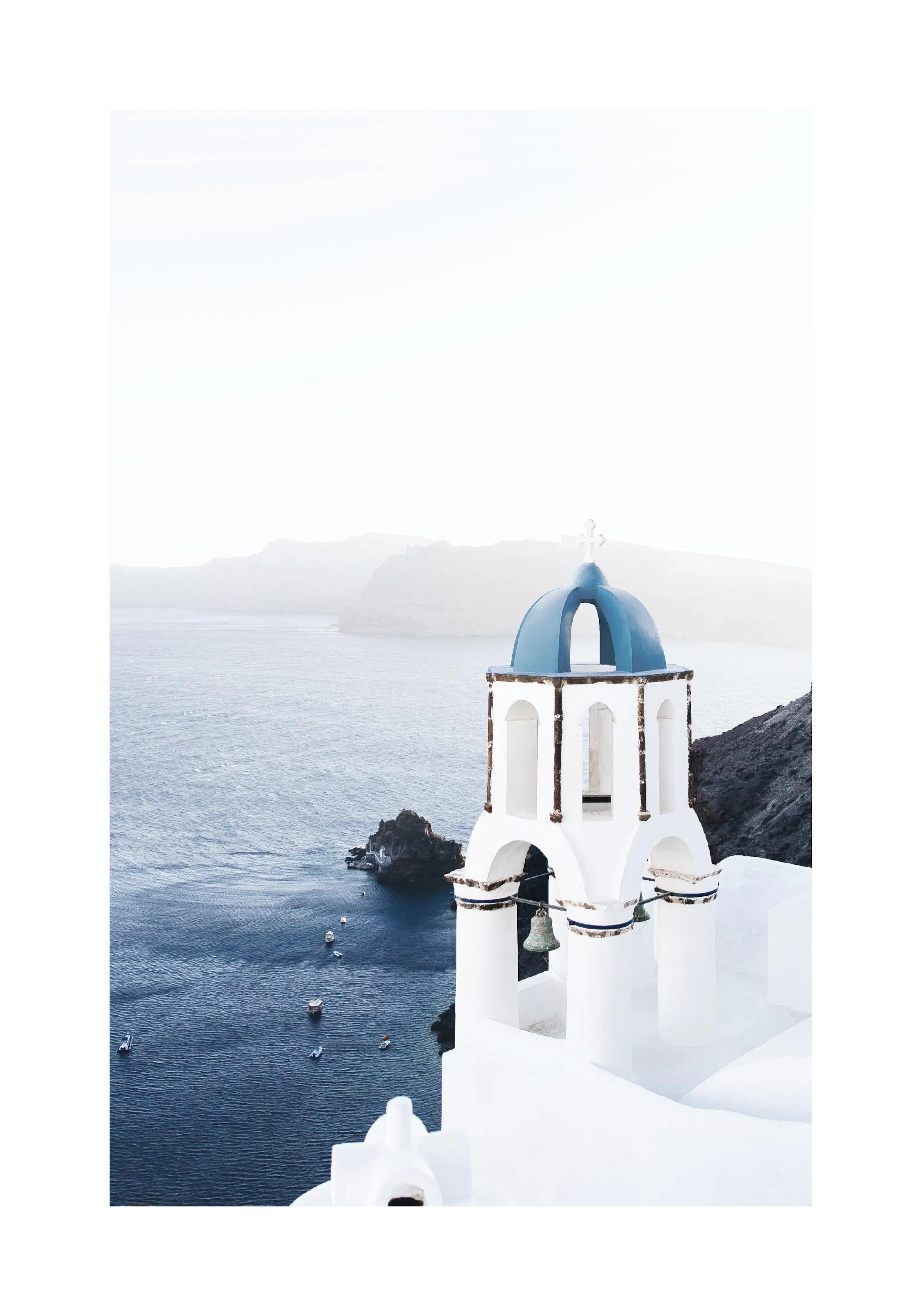 A poster featuring a white bell tower with a blue dome overlooking the deep blue sea, with small boats and distant hills.