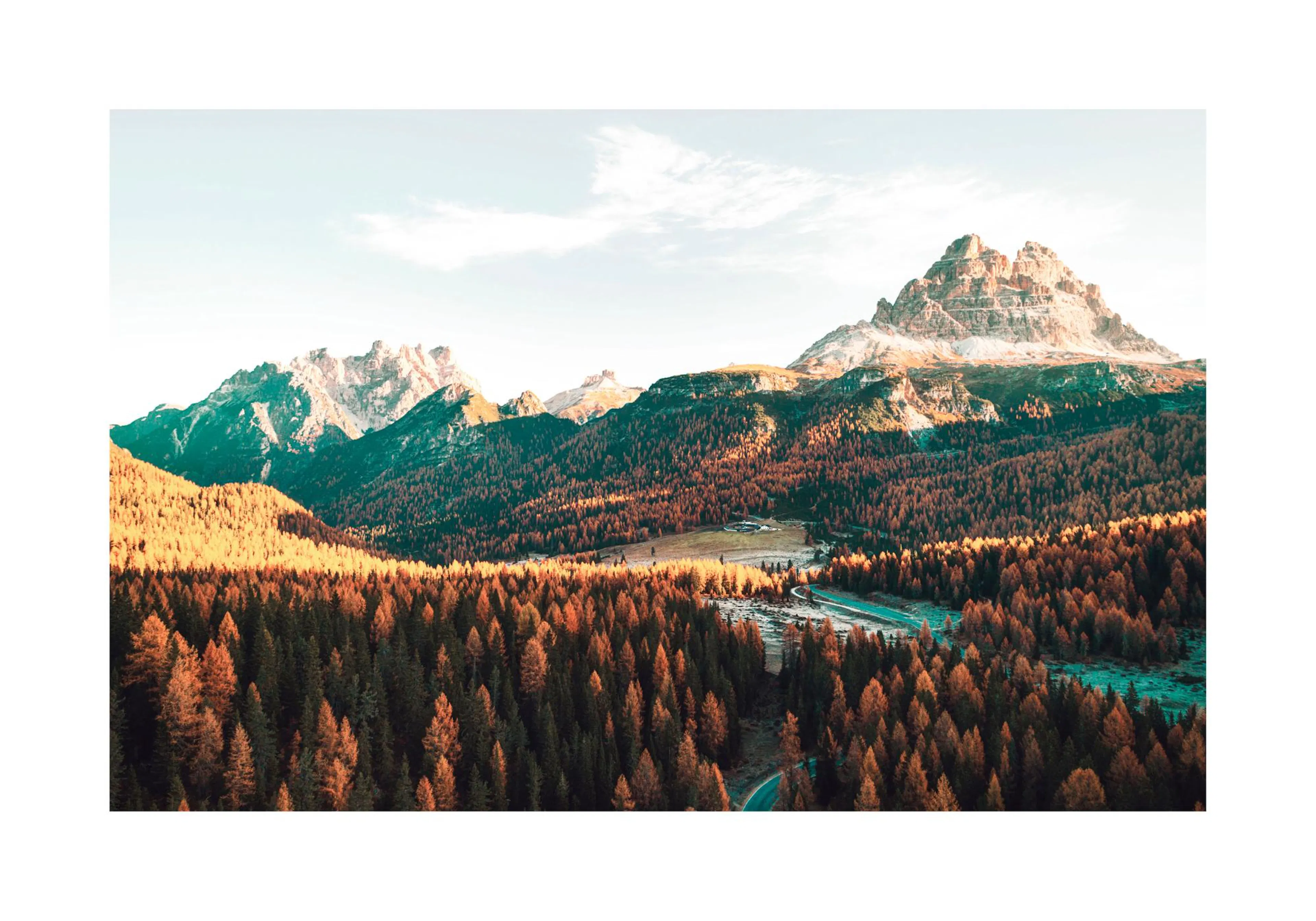 A poster featuring a majestic mountain range with a valley of autumn trees in shades of orange and green, under a clear sky.