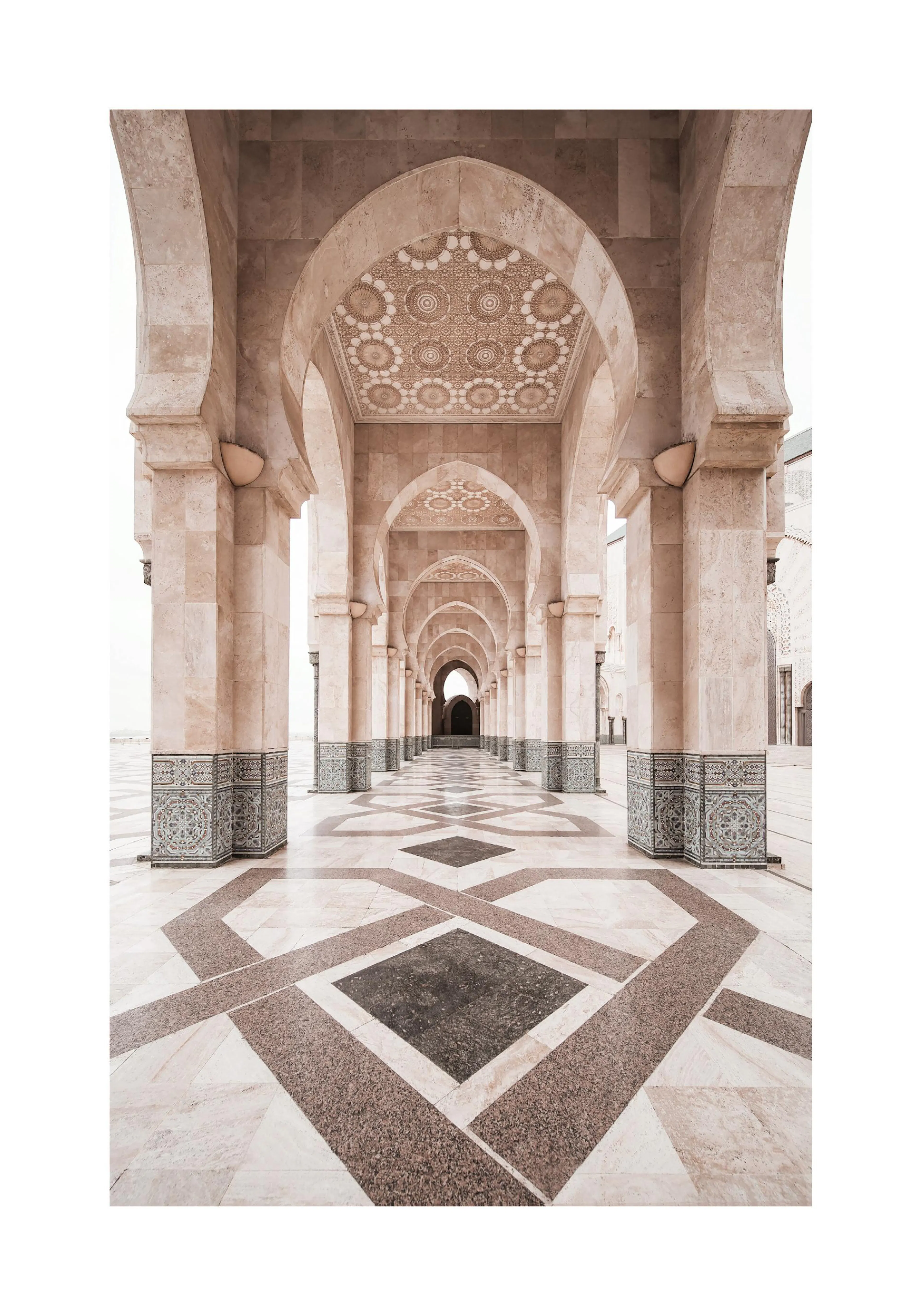 A poster featuring a long hallway of beige stone archways and pillars with intricate patterns, leading to a distant dark arch.