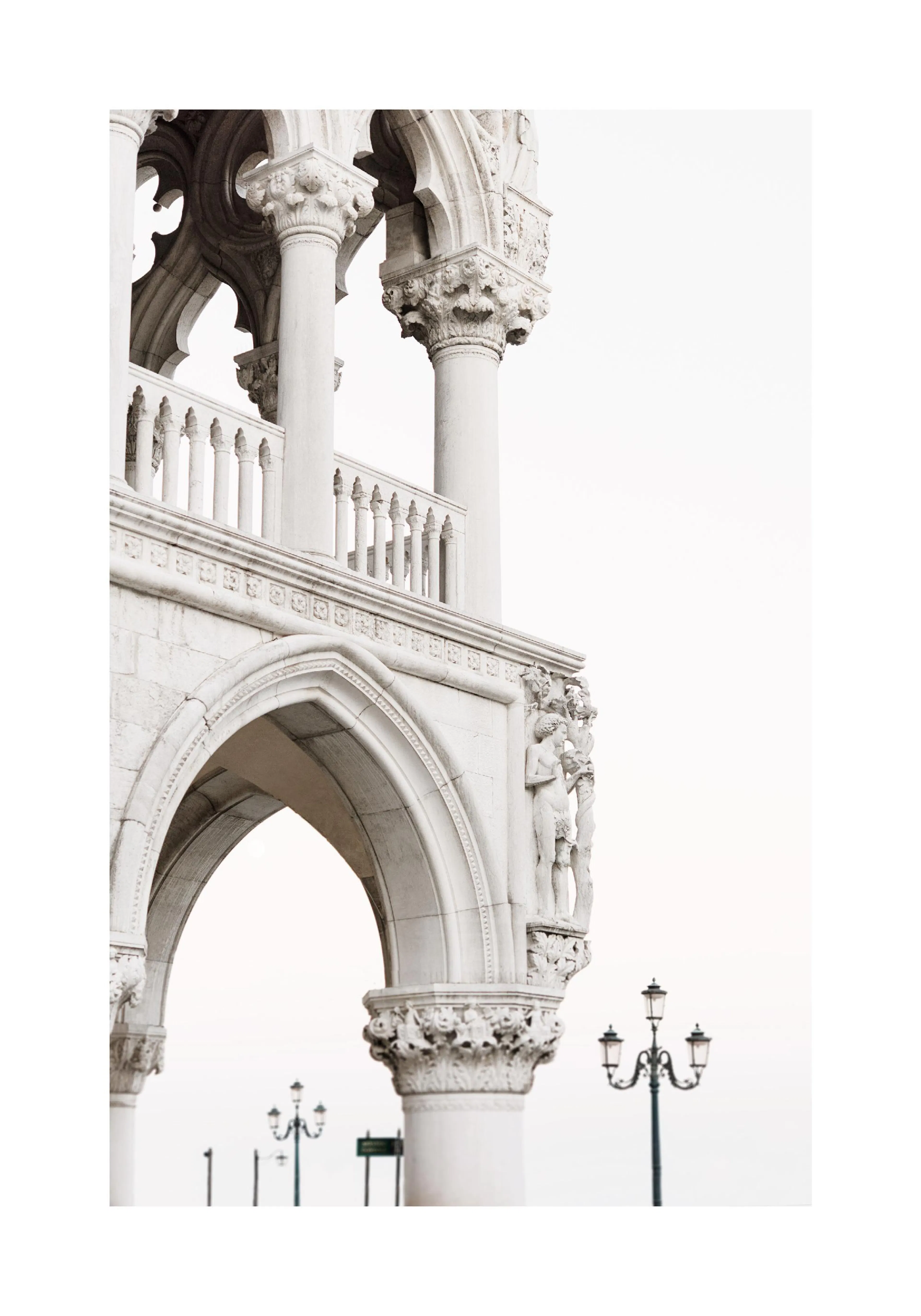 A poster featuring a close-up of white, ornate stone architecture with arches, columns, and a statue against a light sky.