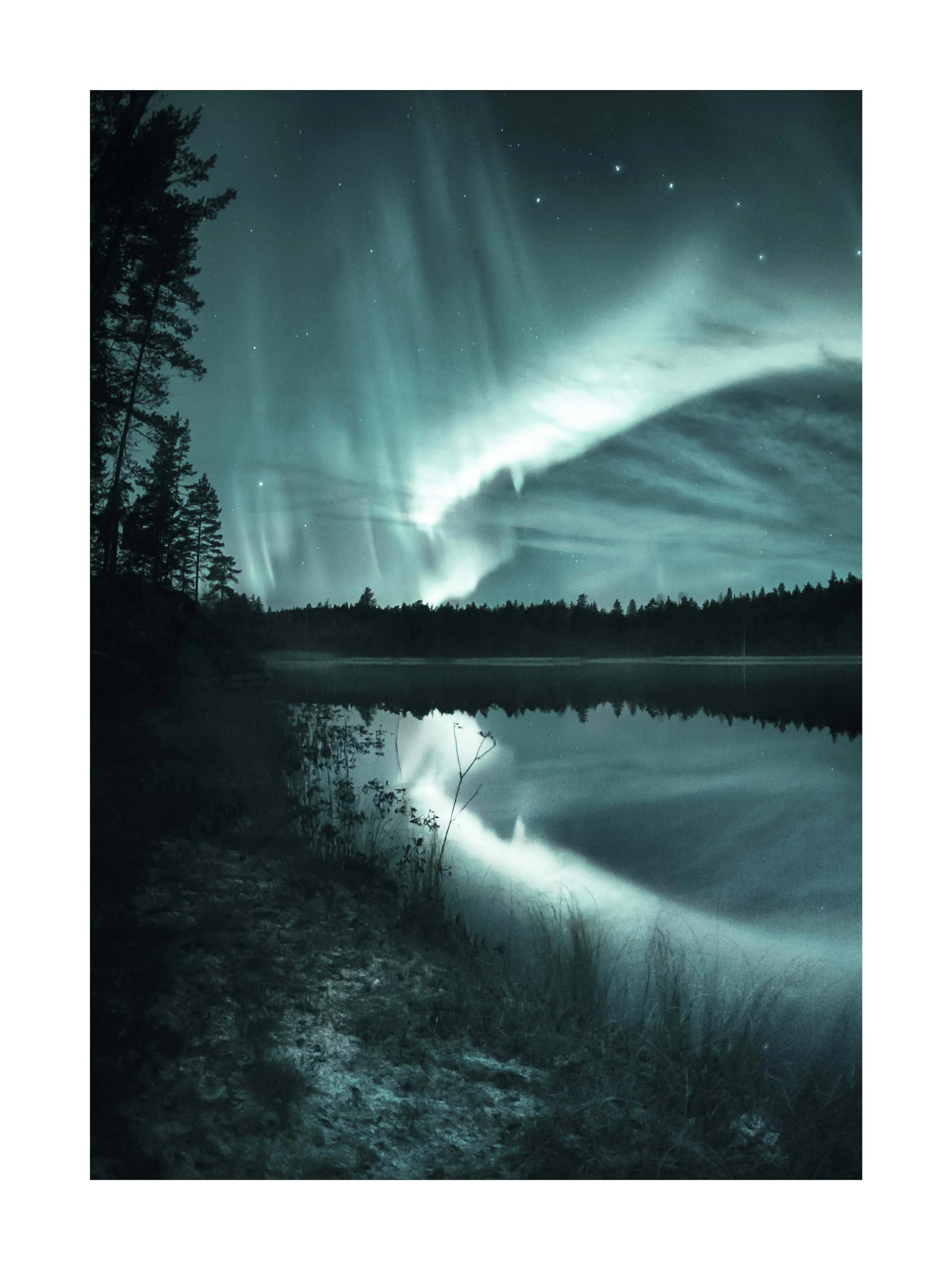 A poster featuring the vibrant aurora borealis dancing across a starry night sky, reflected in a tranquil lake bordered by dark 