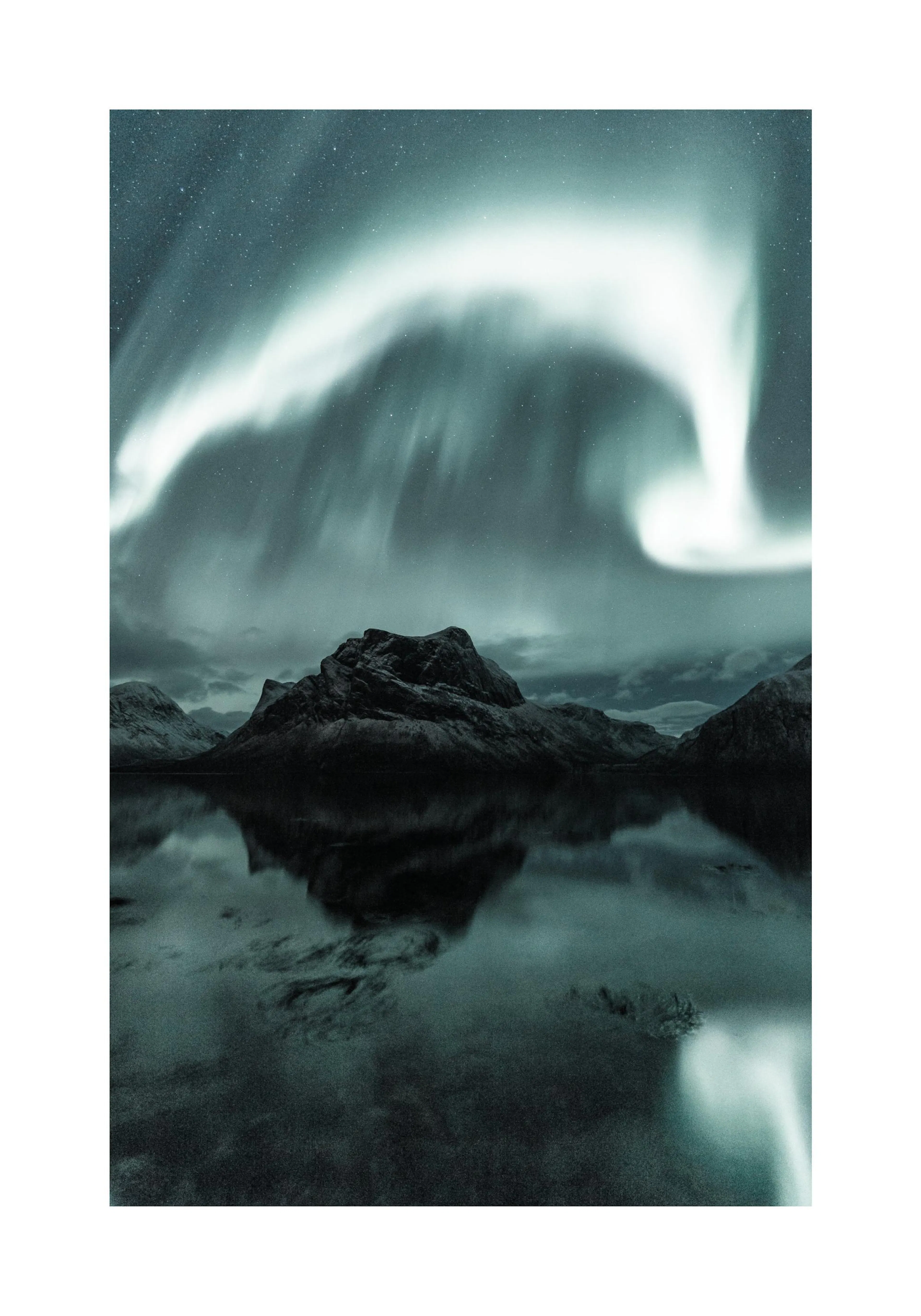 A poster featuring a vibrant green aurora borealis illuminating a dark, starry sky over calm water reflecting the light and surr